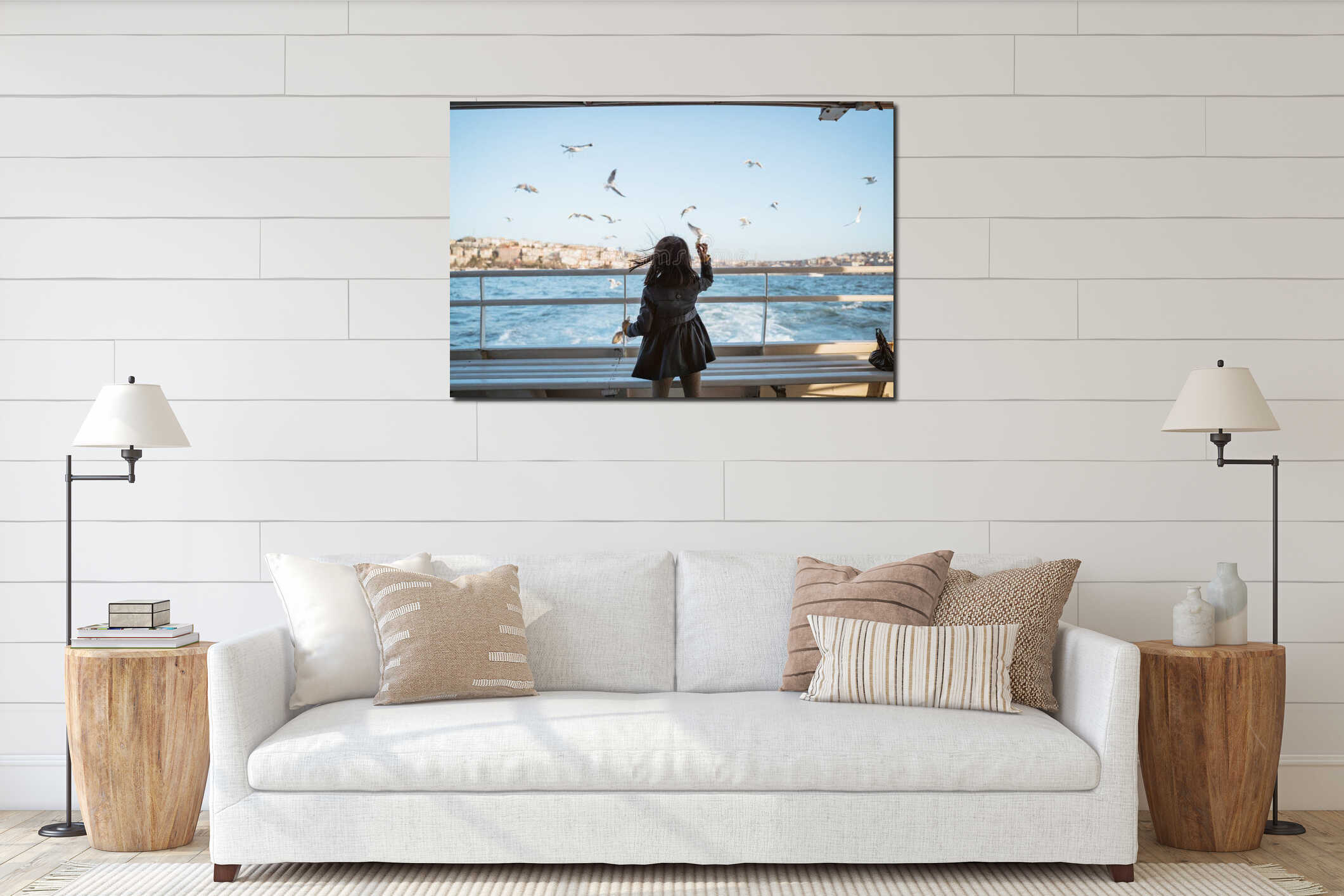 girl feeding seagull while going by ferry boat in interior mockup
