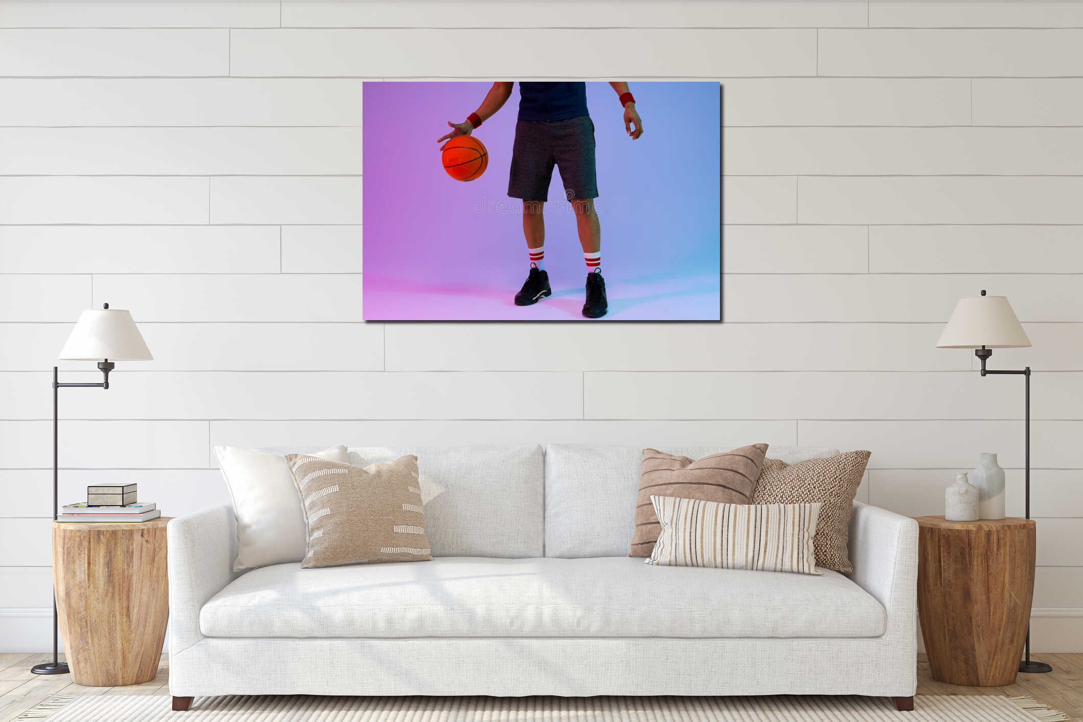 Image of low section of biracial basketball player with basketball on purple to blue background interior mockup
