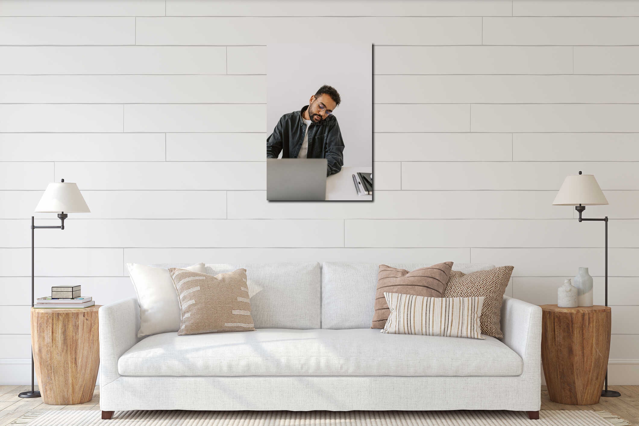 Vertical shot cheerful african american man has business call typing on laptop interior mockup