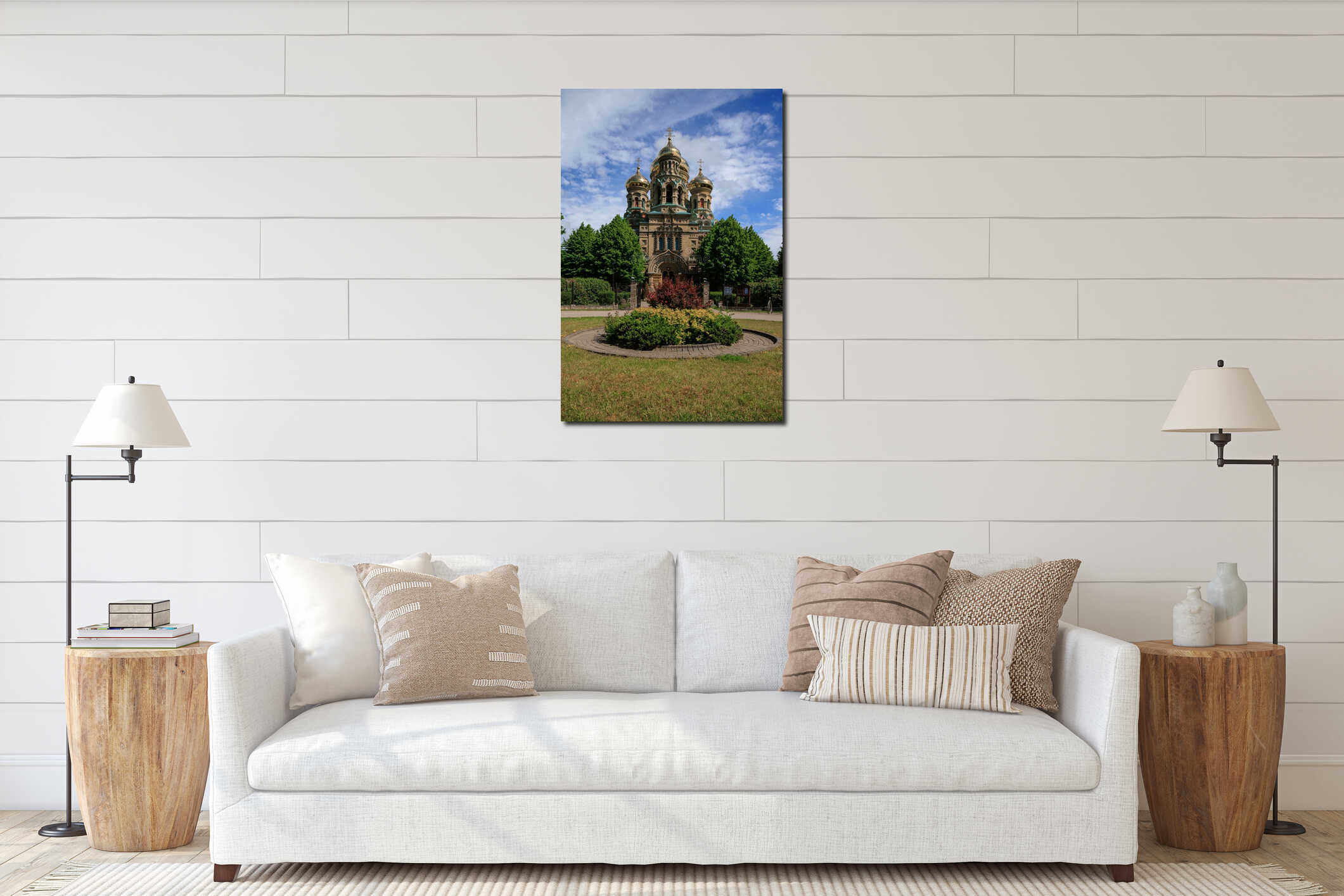 Vertical shot of St Nicholas Naval Cathedral surrounded by greenery under blue cloudy sky in Latvia interior mockup