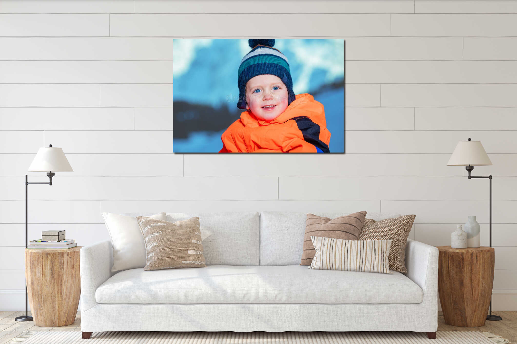 Close portrait of a happy young boy sit in snow over mountains interior mockup