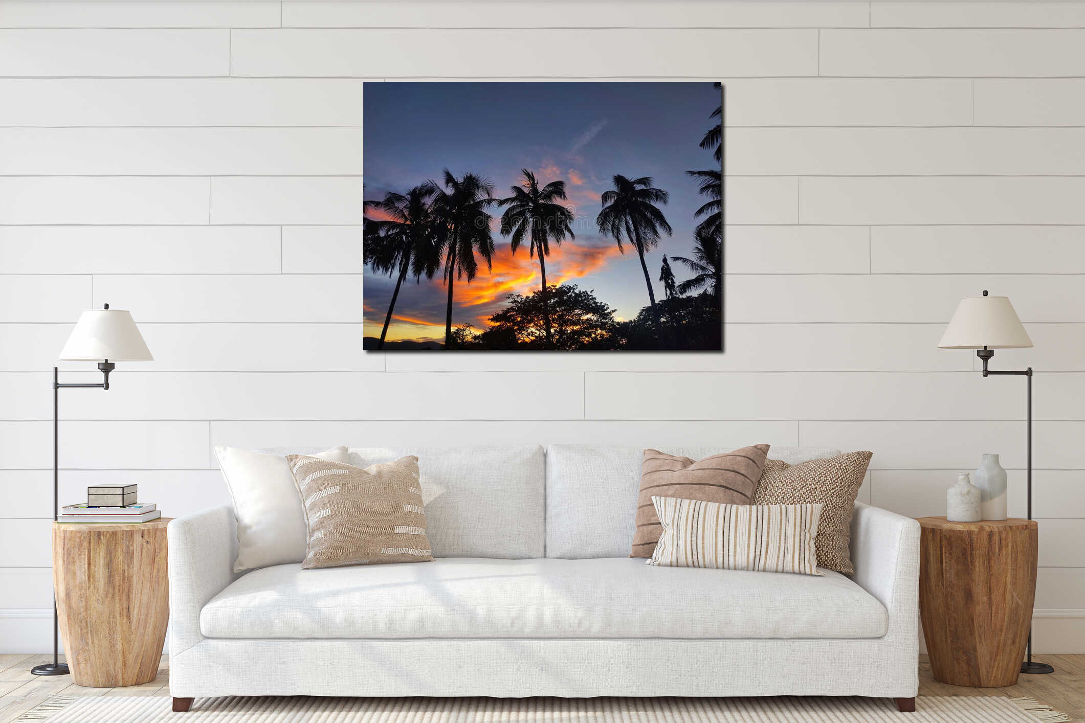 Low angle shot of silhouettes of palm trees under a sunset sky interior mockup
