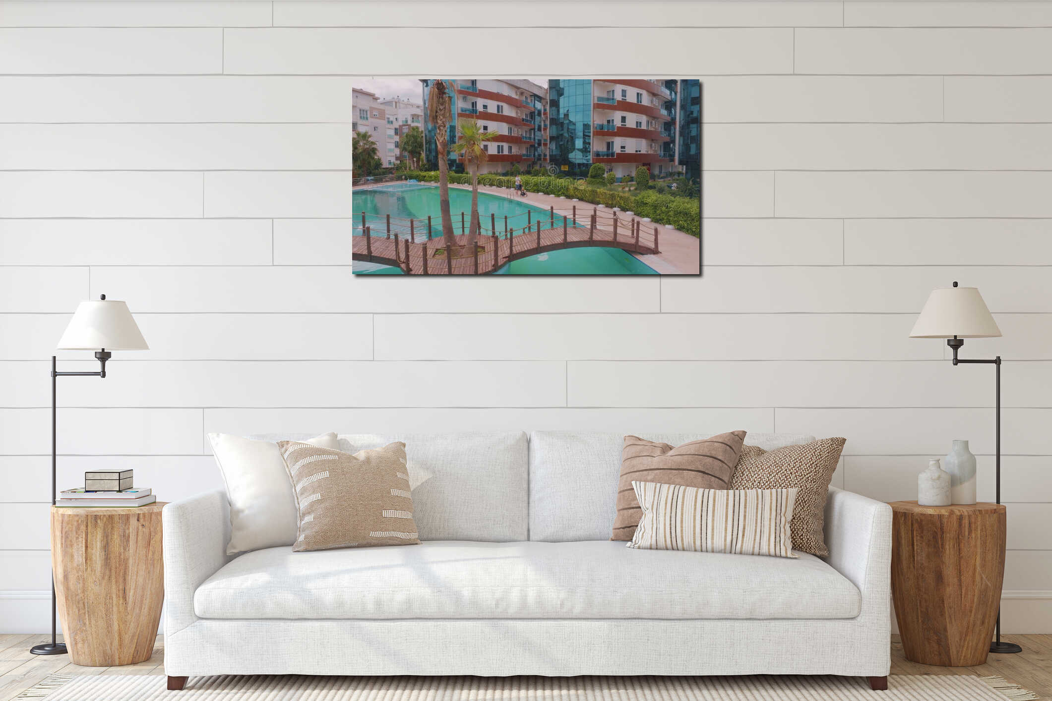 Aerial drone view of the hotel courtyard.Bridge over the pool. Vacation at the resort. Man walking with baby stroller interior mockup