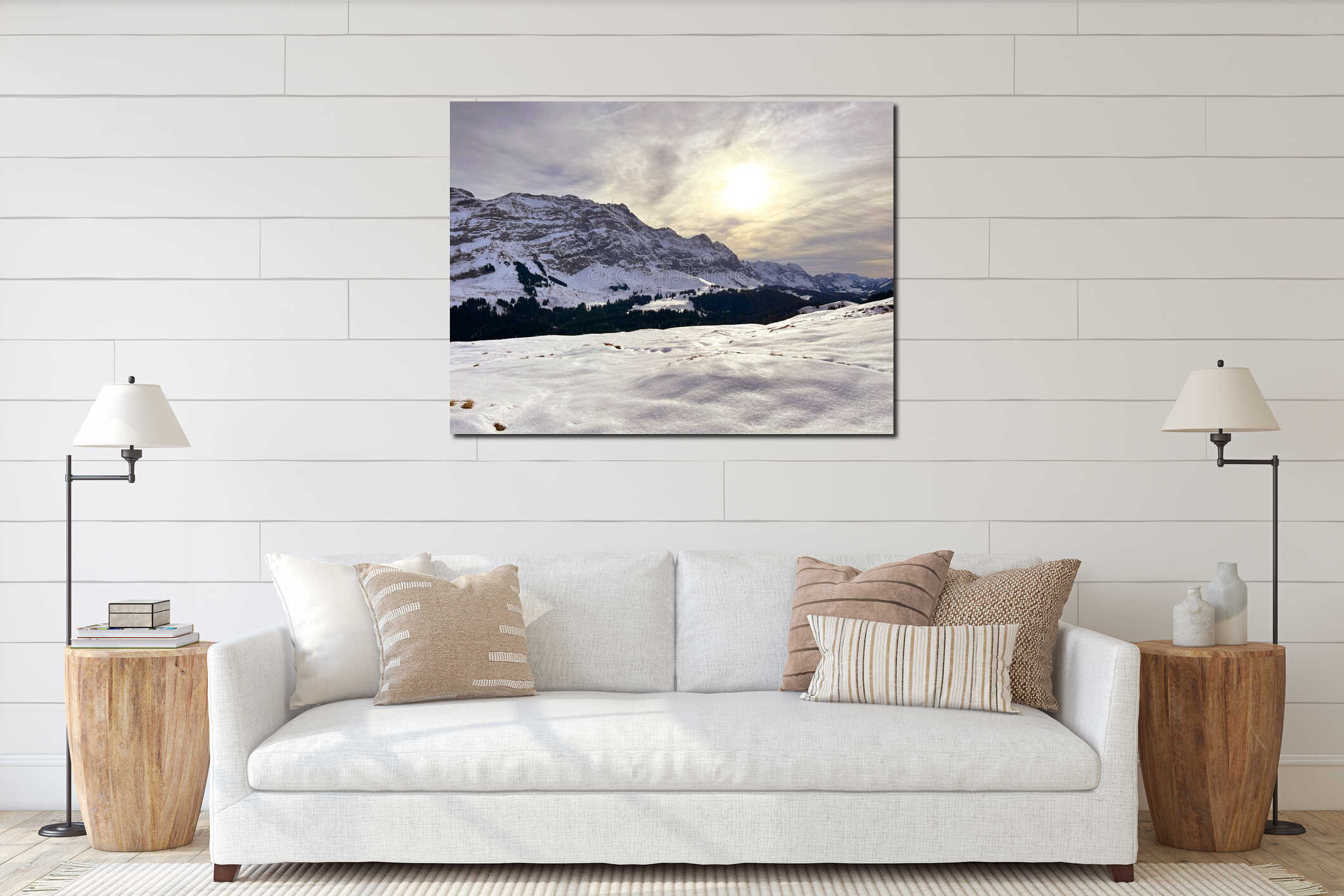 Late evening winter sun over the snow-covered slopes of the Alpstein mountain range and before dusk over massif of the Alps interior mockup