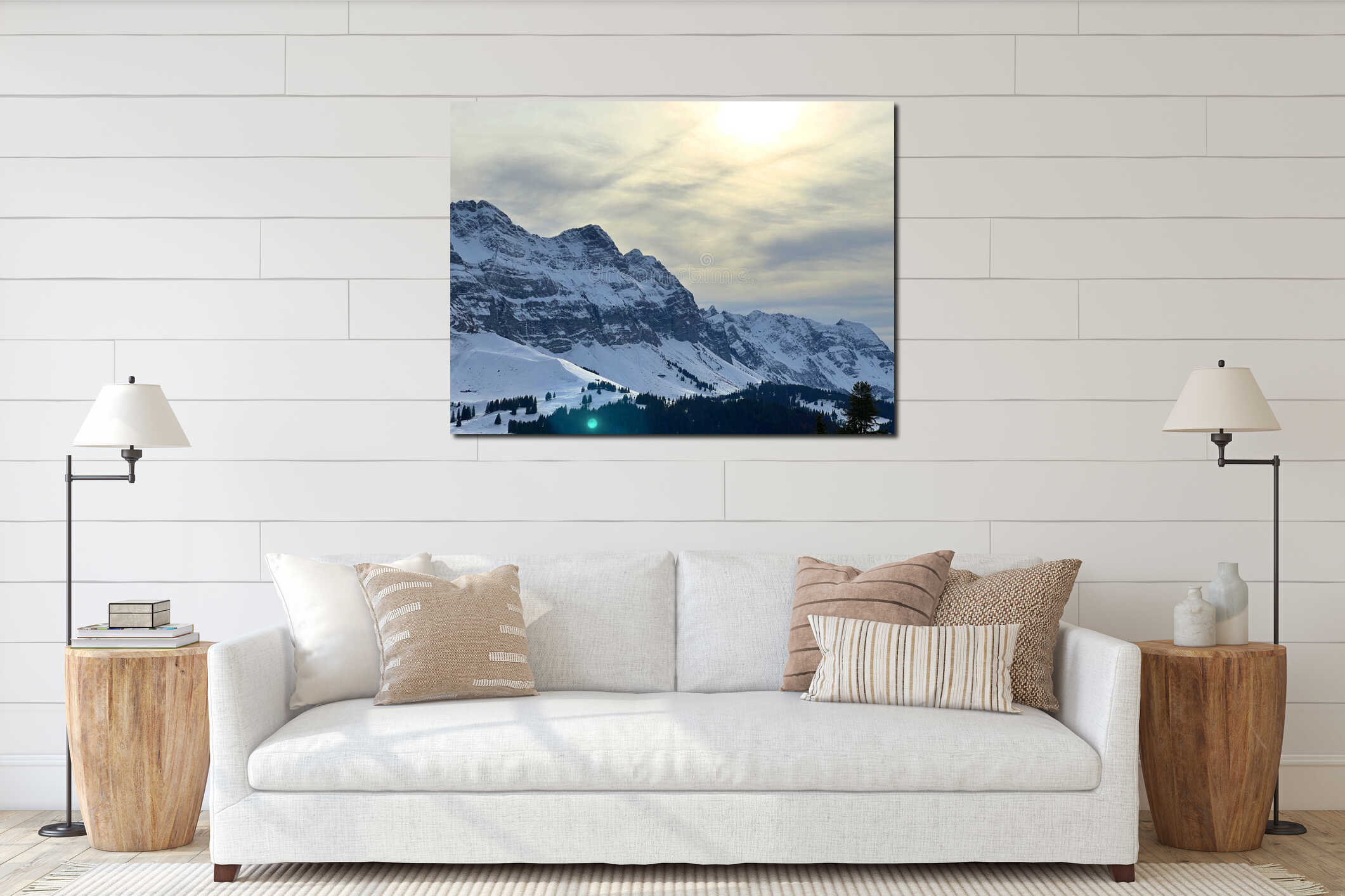 Late evening winter sun over the snow-covered slopes of the Alpstein mountain range and before dusk over massif of the Alps interior mockup