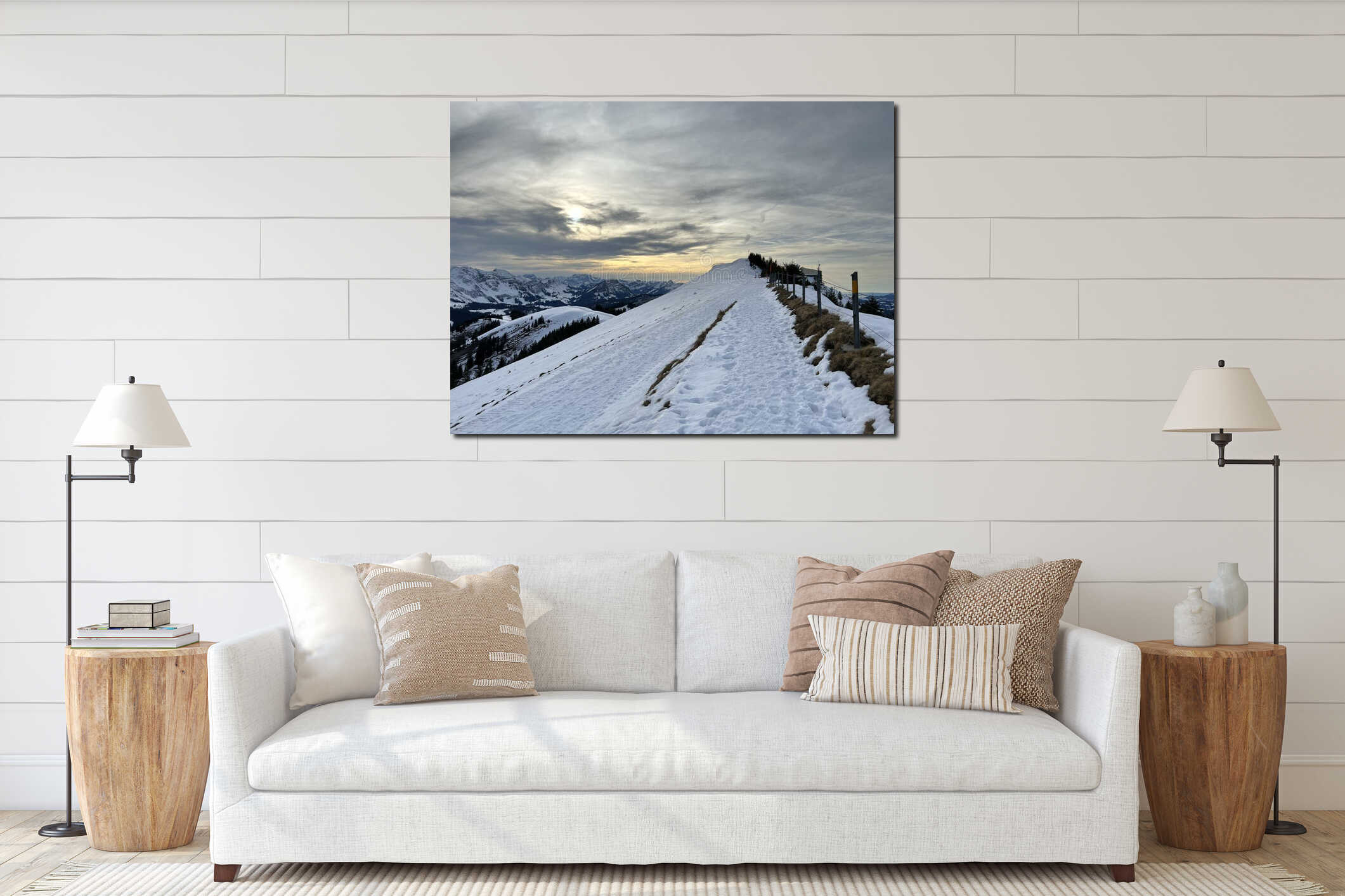 Late evening winter sun over the snow-covered slopes of the Alpstein mountain range and before dusk over massif of the Alps interior mockup