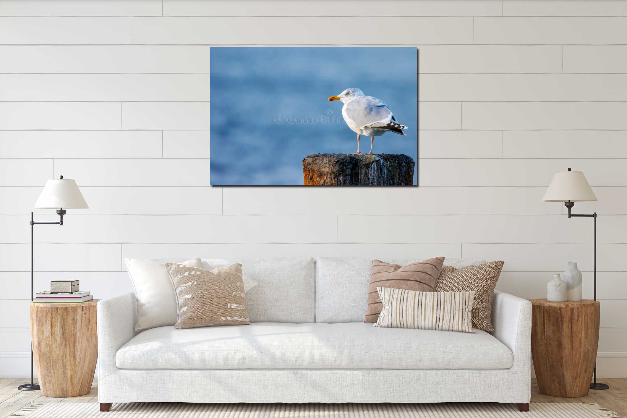 Portrait of a big seagull standing on a pillar interior mockup