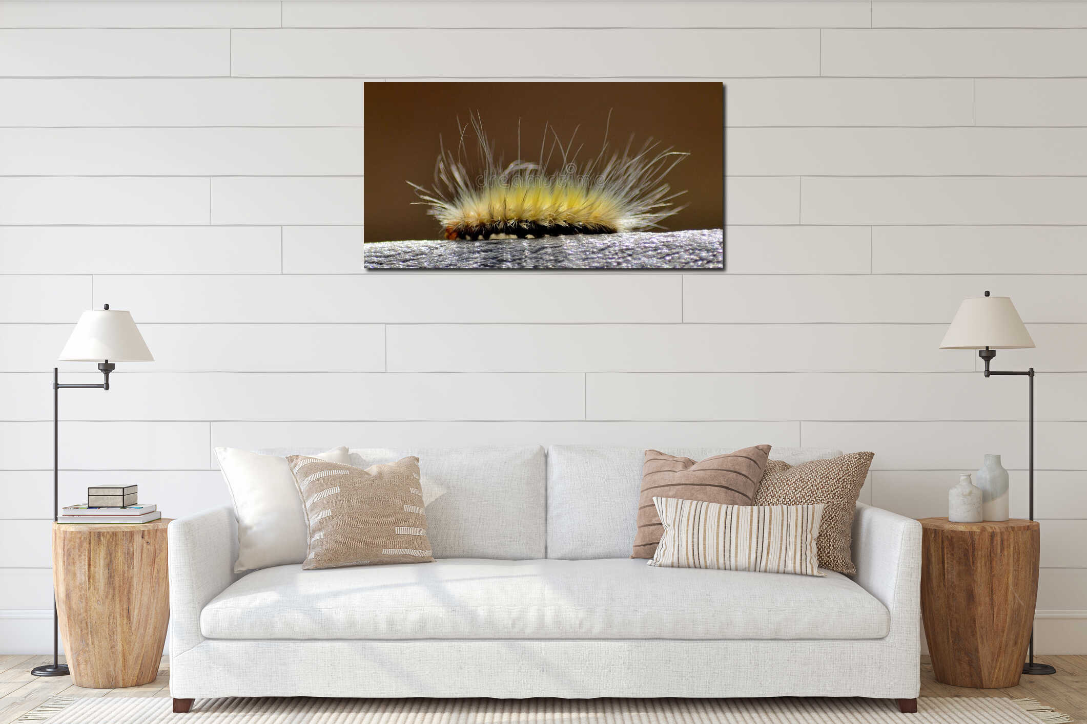 Closeup shot of a very fuzzy, hairy yellow caterpillar walking along a branch interior mockup