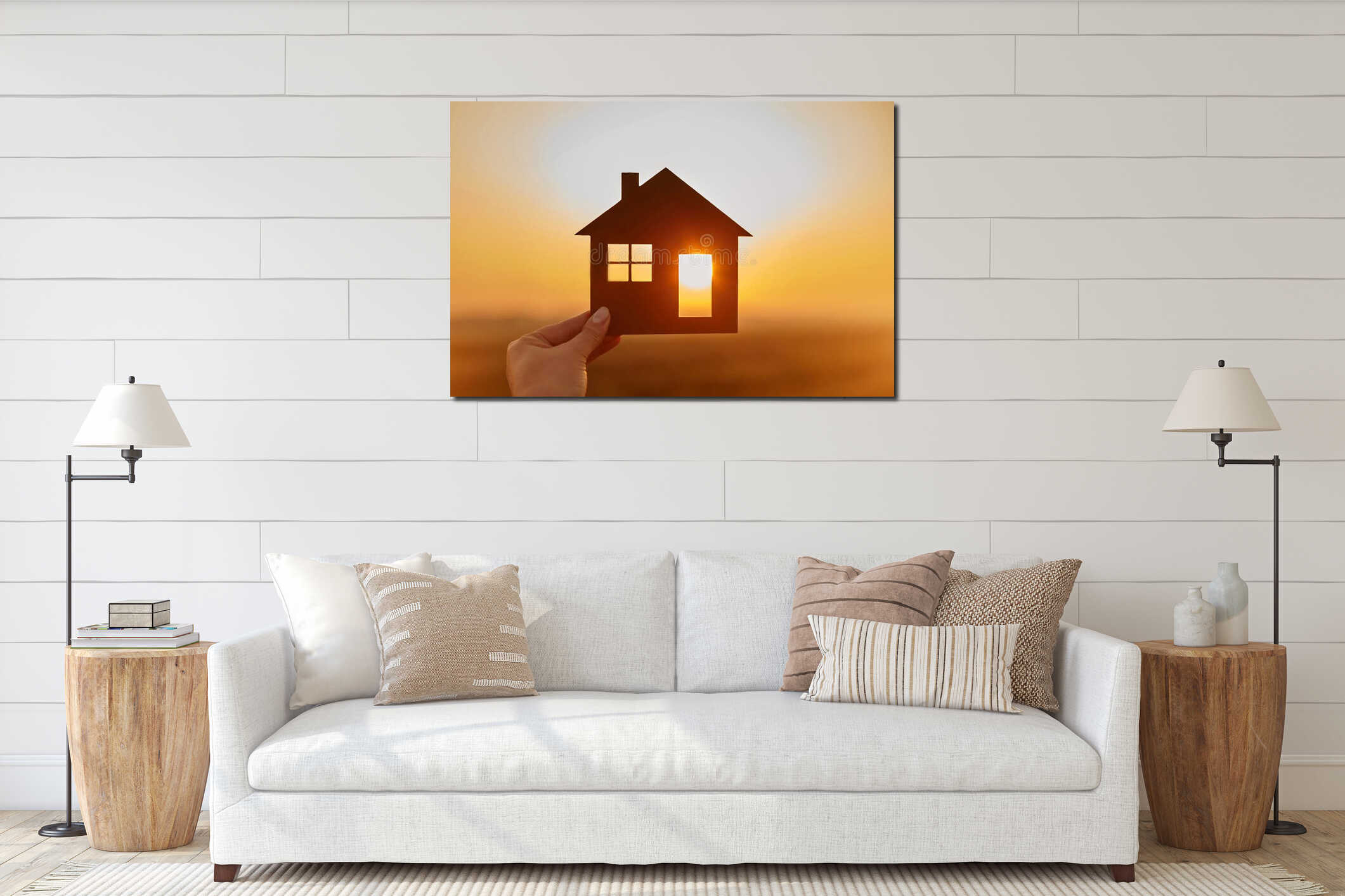 Woman hand holds wooden house against the sun interior mockup