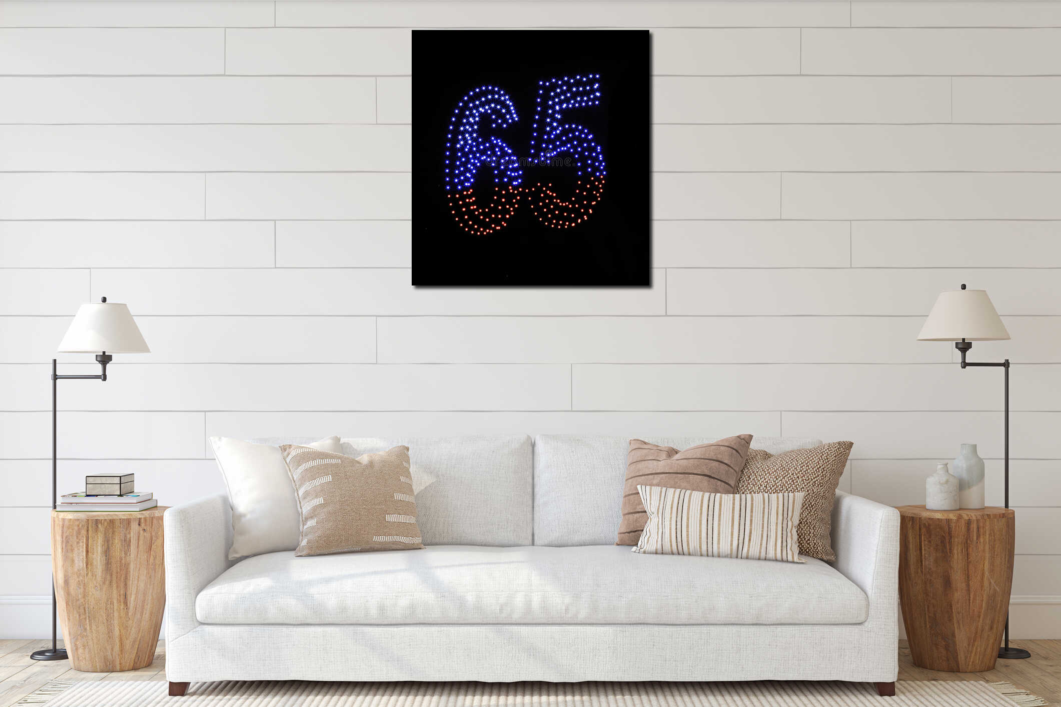 Drone light shows on black night sky background. A figure of the number six, five, sixty five, 65 made of glowing drones interior mockup