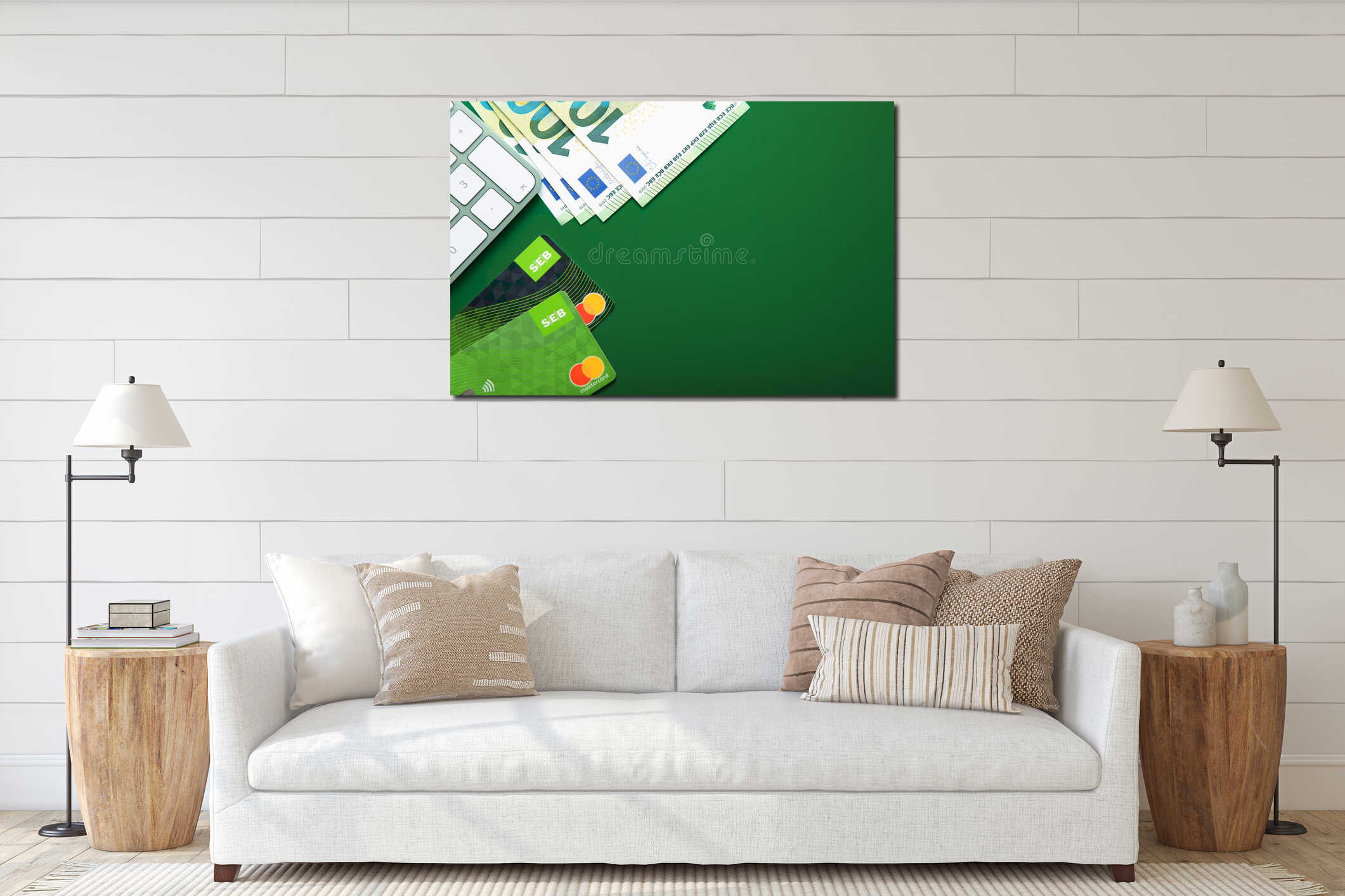 LONDON,UK - NOVEMBER 15, 2022: Seb bank credit and debit mastercard with keyboard and hundred euro banknotes on green interior mockup