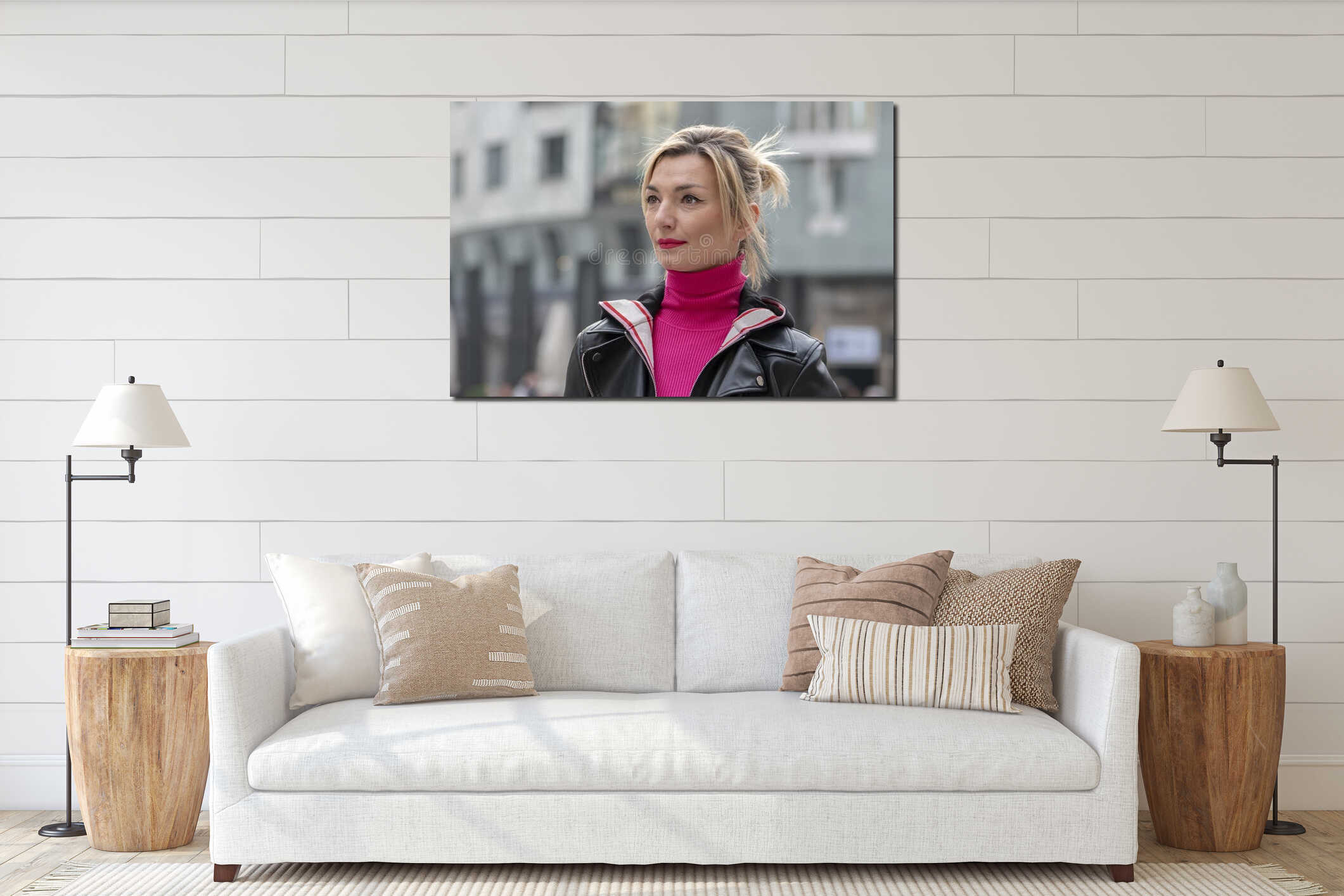 Street emotional portrait of a blonde woman 35-40 years old on a blurry urban background, serious facial expression. interior mockup