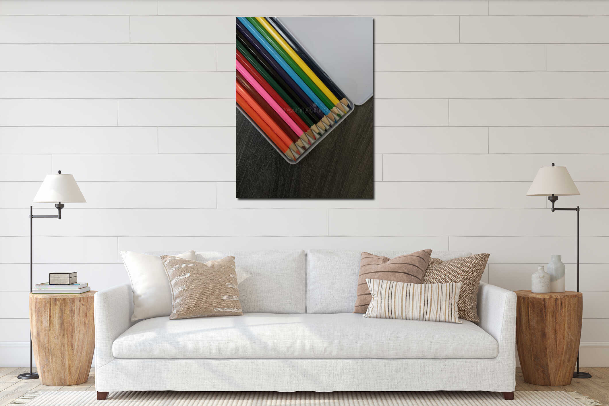 A set of colored pencils in a metal box on a gray textured background. interior mockup