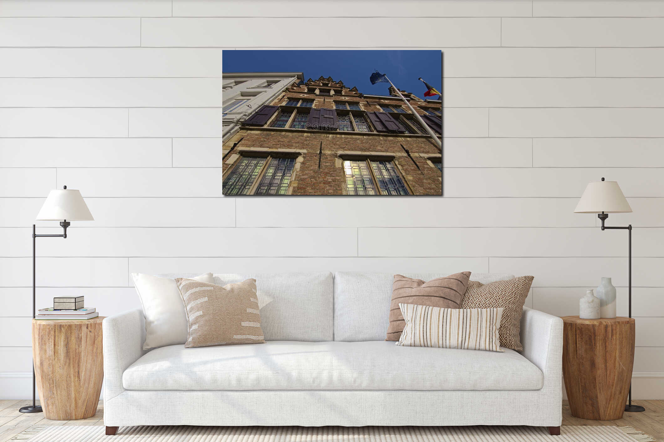 Scenic wide-angle view of the ancient brick wall of Rubens House against blue sky interior mockup