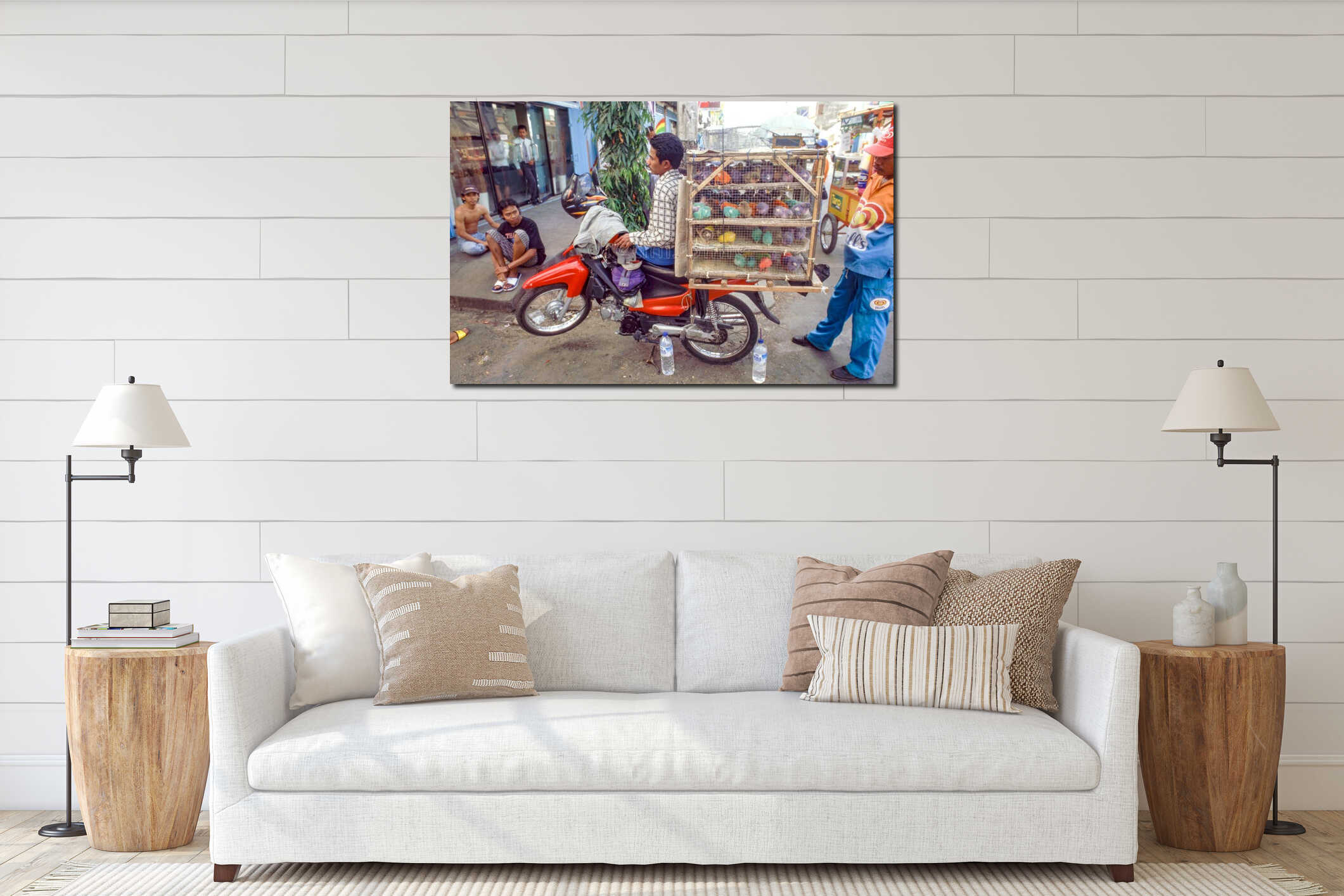 young man with motorbike sells painted birds in yellow, blue and green to young people interior mockup