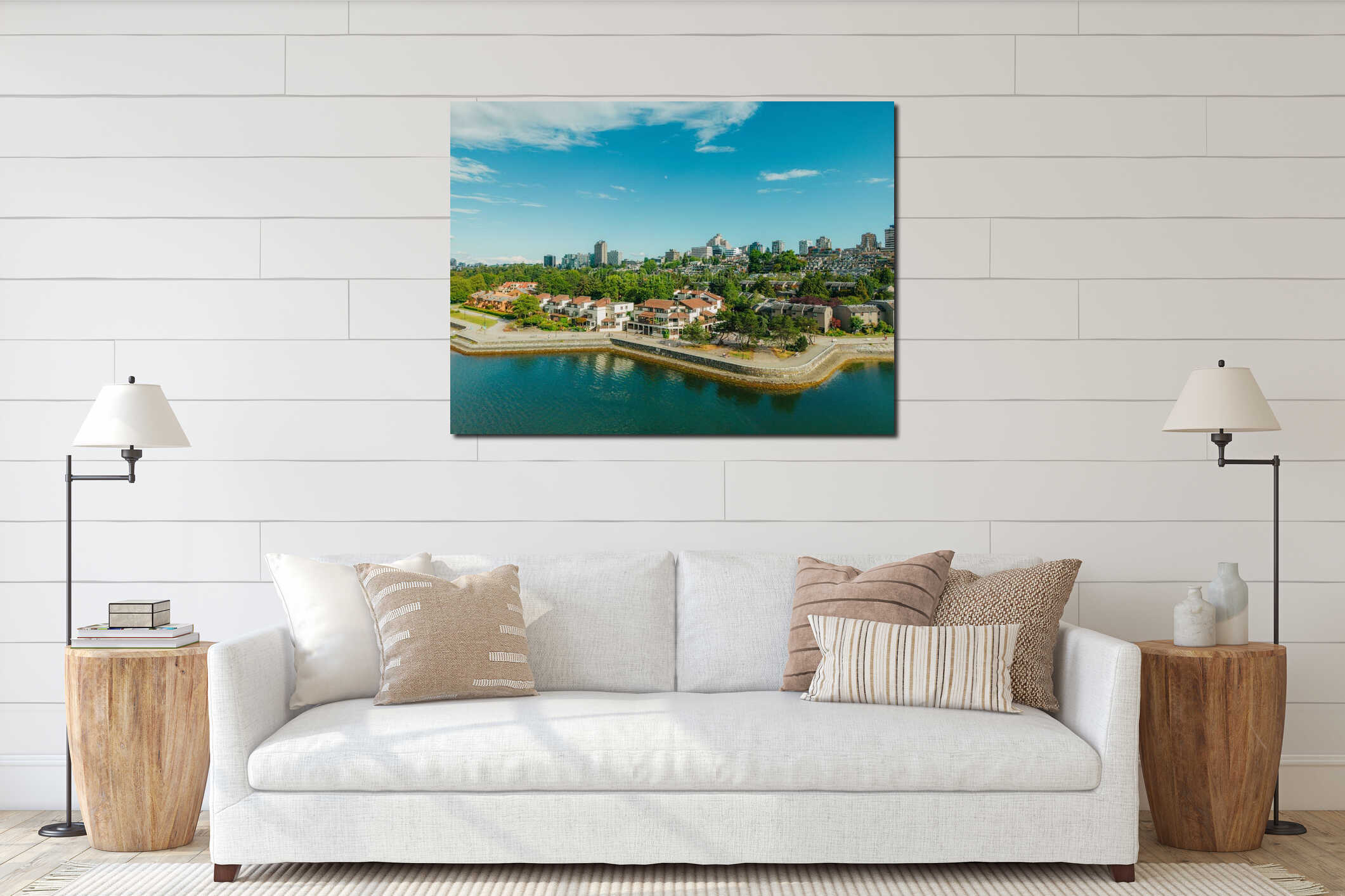 Scenic aerial view of a vibrant cityscape of Vancouver overlooking the body of water below interior mockup