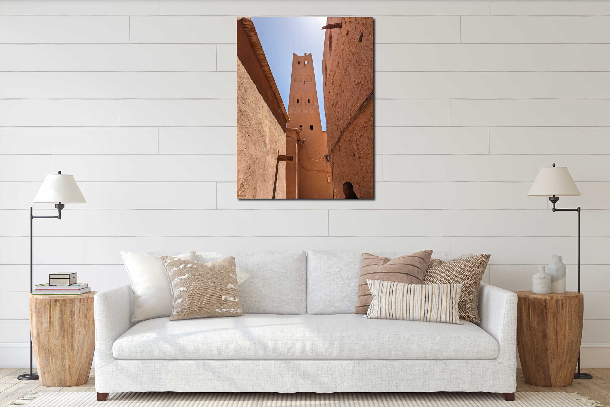 Minaret of a historic mosque built of clay in the ancient city center of Amezrou in the Draa valley interior mockup