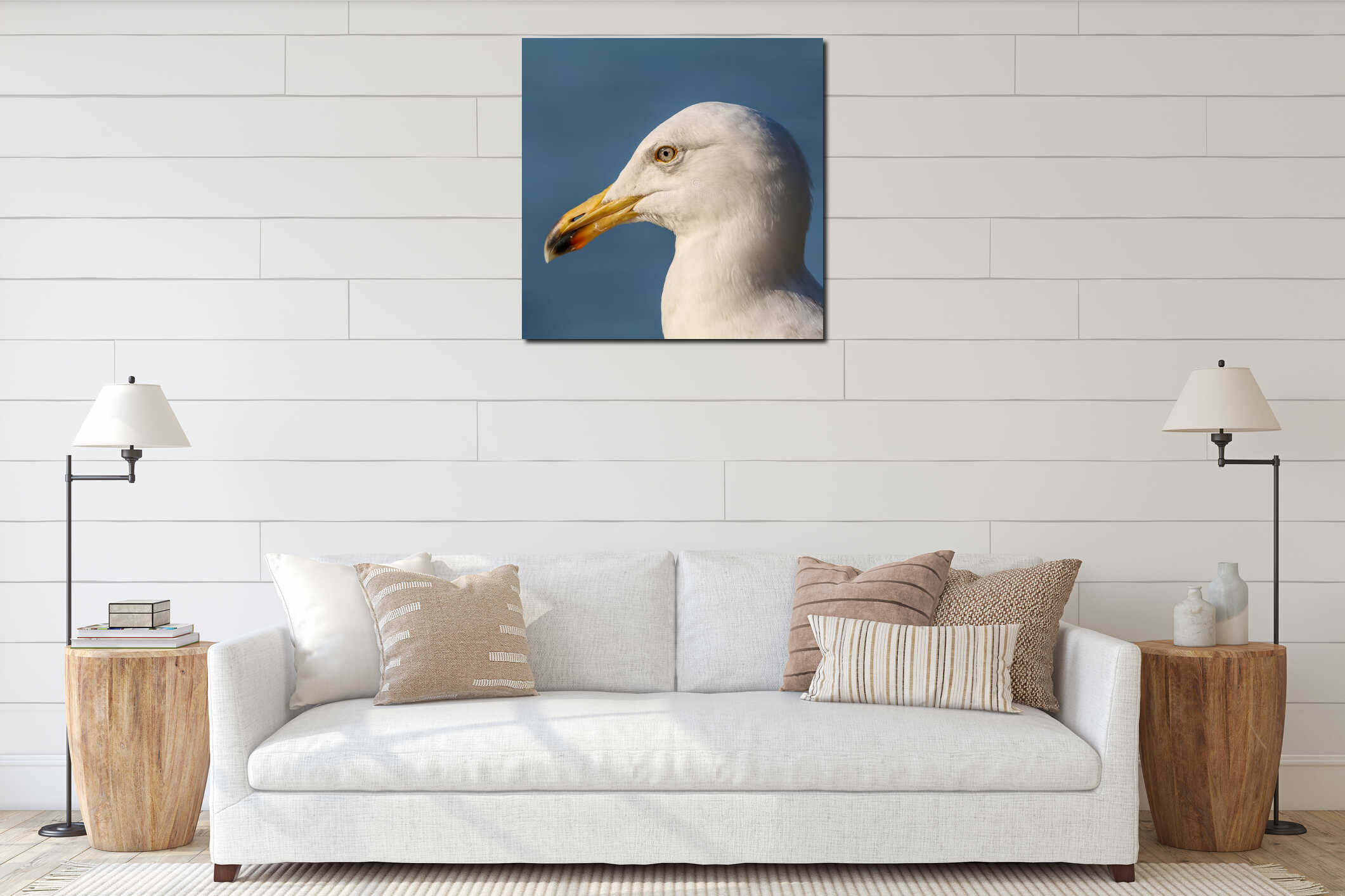 Close-up of a seagull against a backdrop of a blue sky. interior mockup