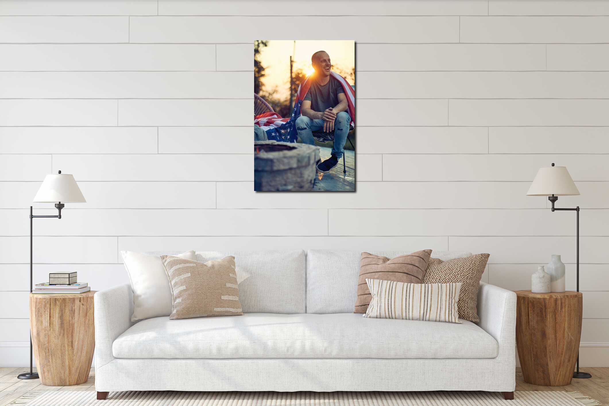 Full body vertical shot of cheerful man with the flag of USA on his back, relaxing in a cozy chair outdoors interior mockup