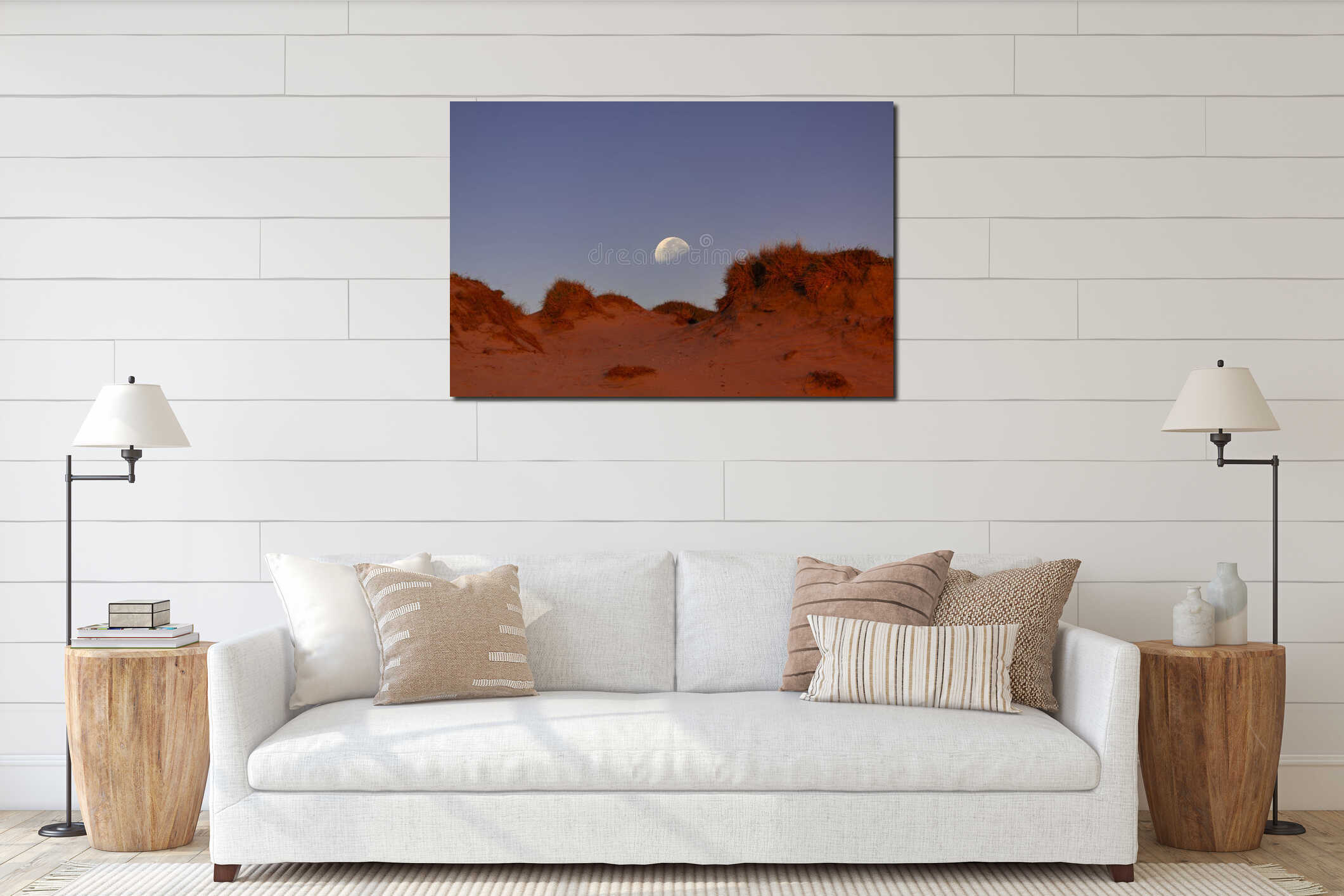 In the evening's twilight, the moon rises above the beach's Mars-like hues, painting a tranquil coastal panorama interior mockup