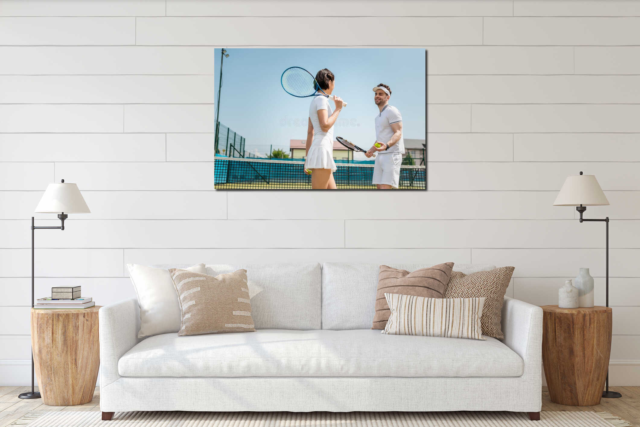 positive couple holding tennis balls and interior mockup