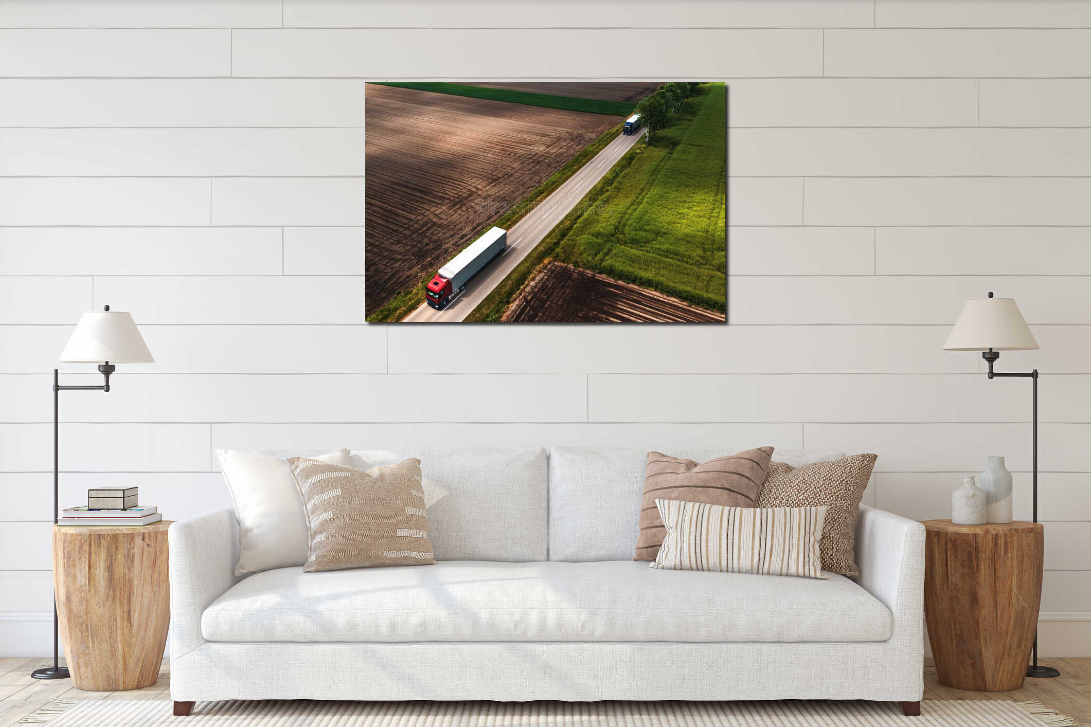 Two large semi-trucks on countryside road seen from drone pov, aerial shot of trucking and logistics concept interior mockup