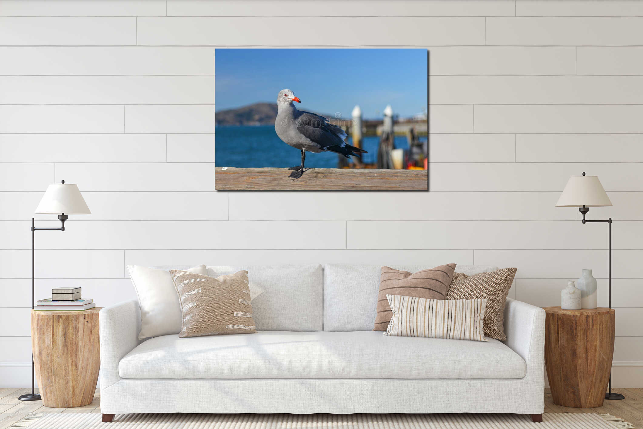 Seagull standing on a wooden pier in front of a harbor interior mockup