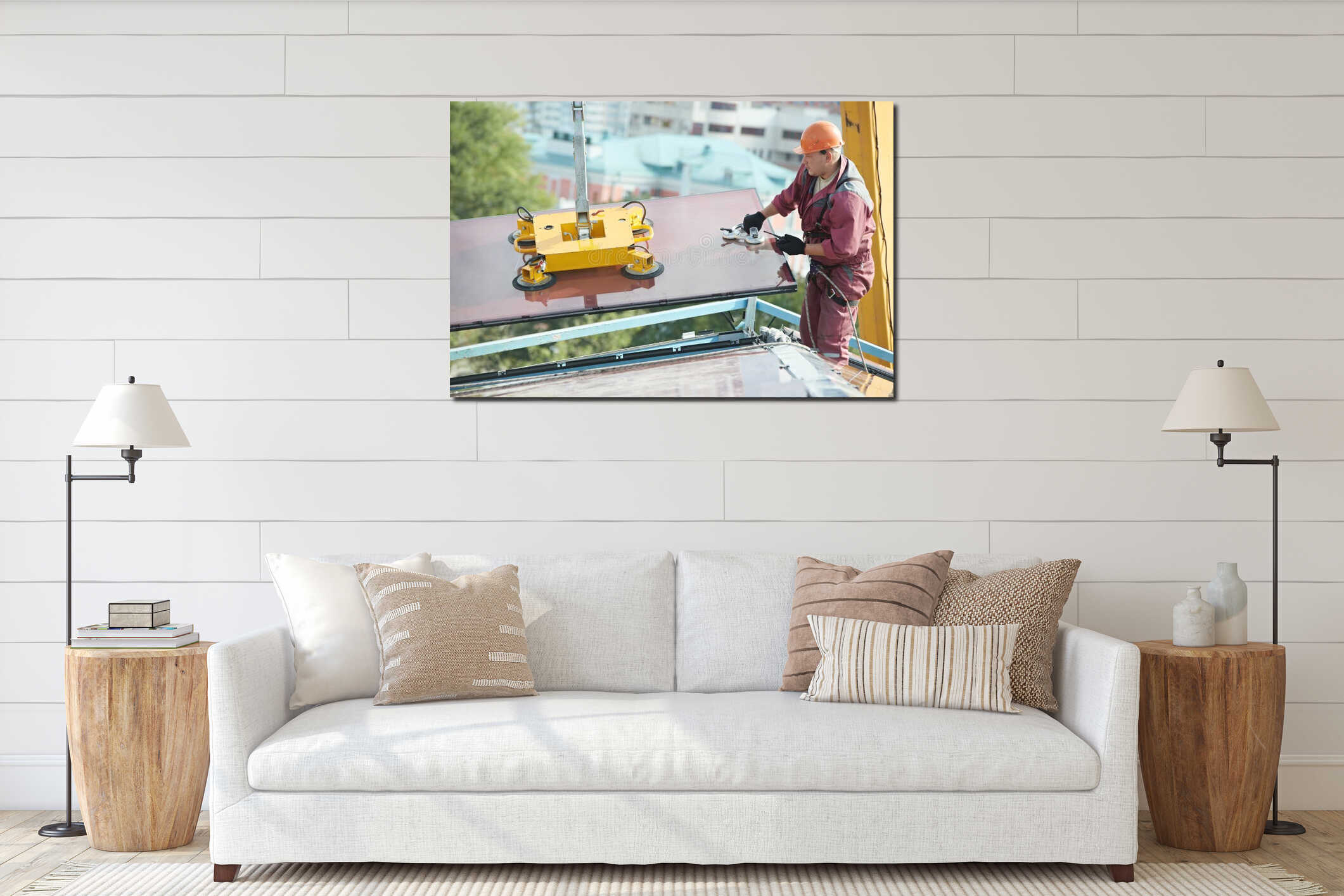 Builder joiner installing glass window on building interior mockup