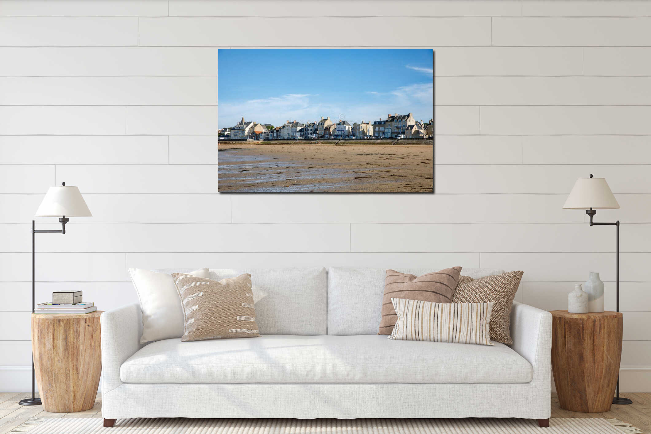 View of coastal street of Grandcamp Maisy, a scenic French coastal town in Normandy, with fishing port, sandy beaches interior mockup