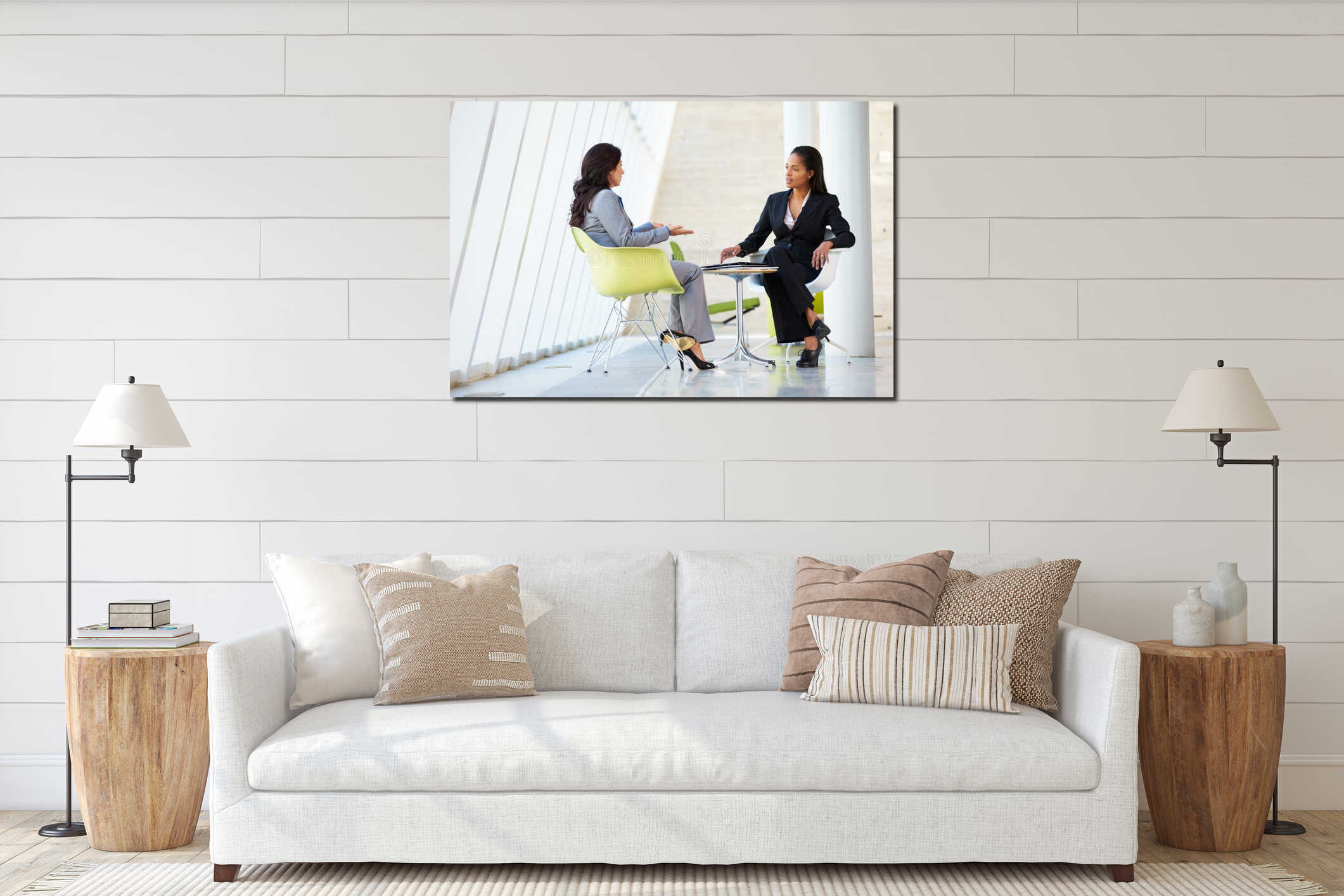Two Businesswomen Meeting Around Table In Modern Office interior mockup