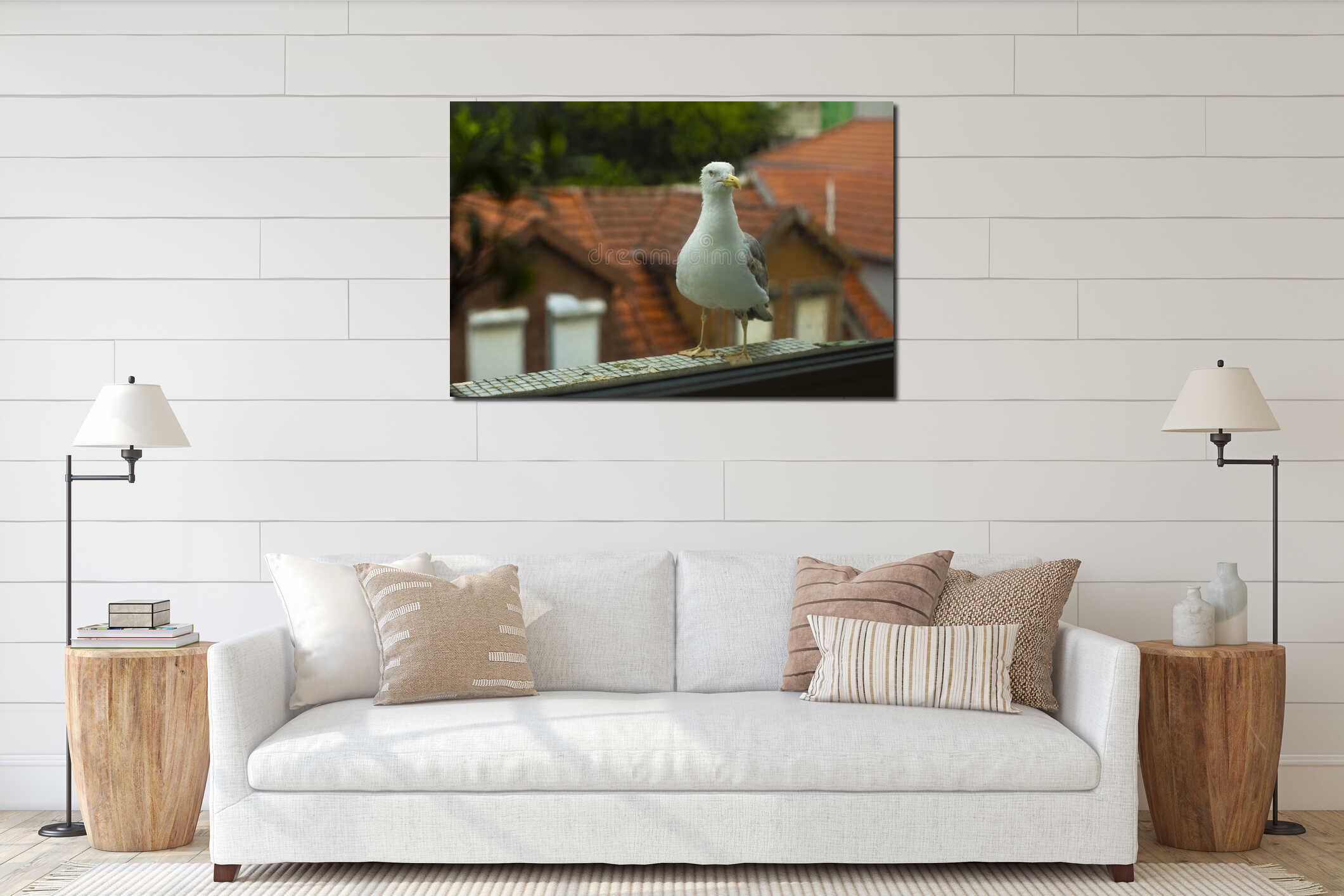 A seagull is sitting on the railing of the balcony. interior mockup