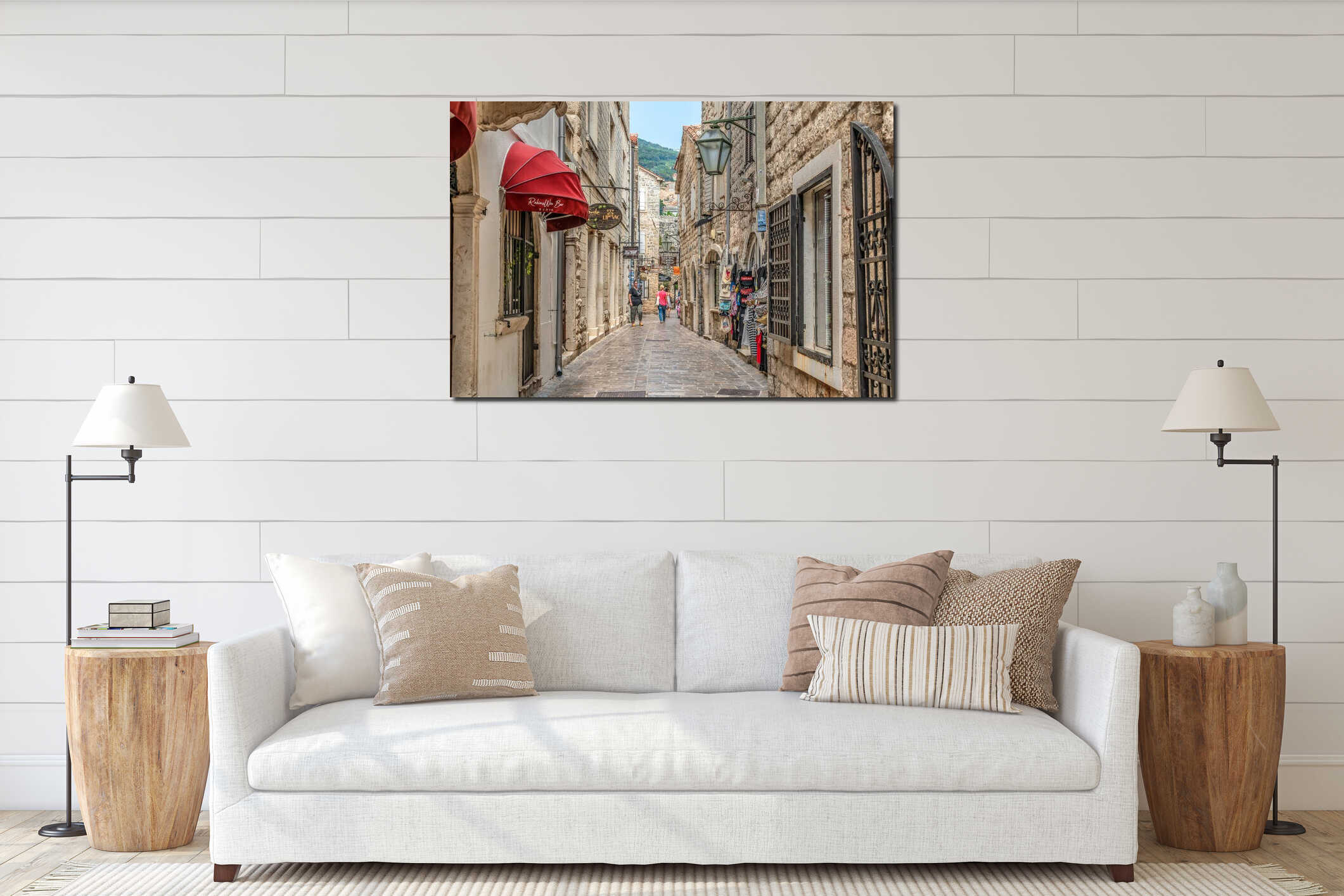 People walk among tourist shops and restaurants on a narrow medieval street interior mockup