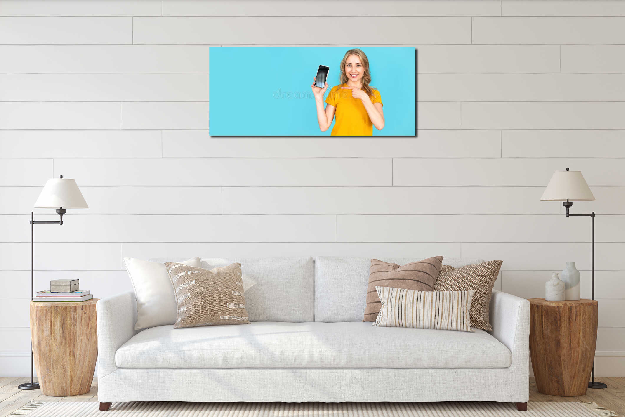 Happy woman pointing with finger aside on empty display at her modern smartphone interior mockup