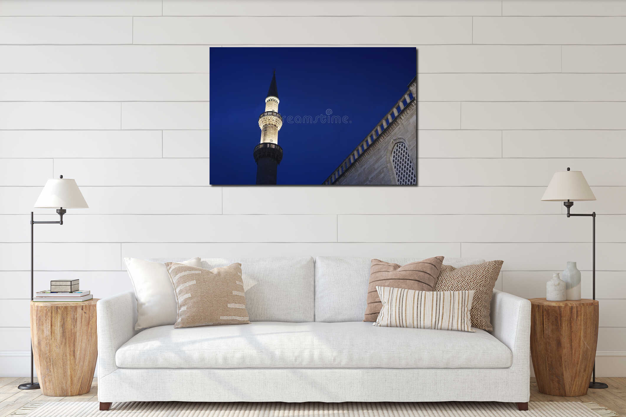 Detail of minaret of Suleymaniye mosque in Istanbul (Turkey) at night with dark blue sky in the background interior mockup