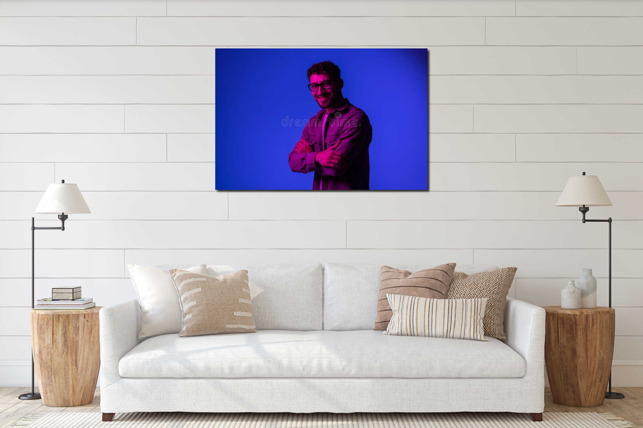 Young thoughtful man bright blue neon light interior mockup