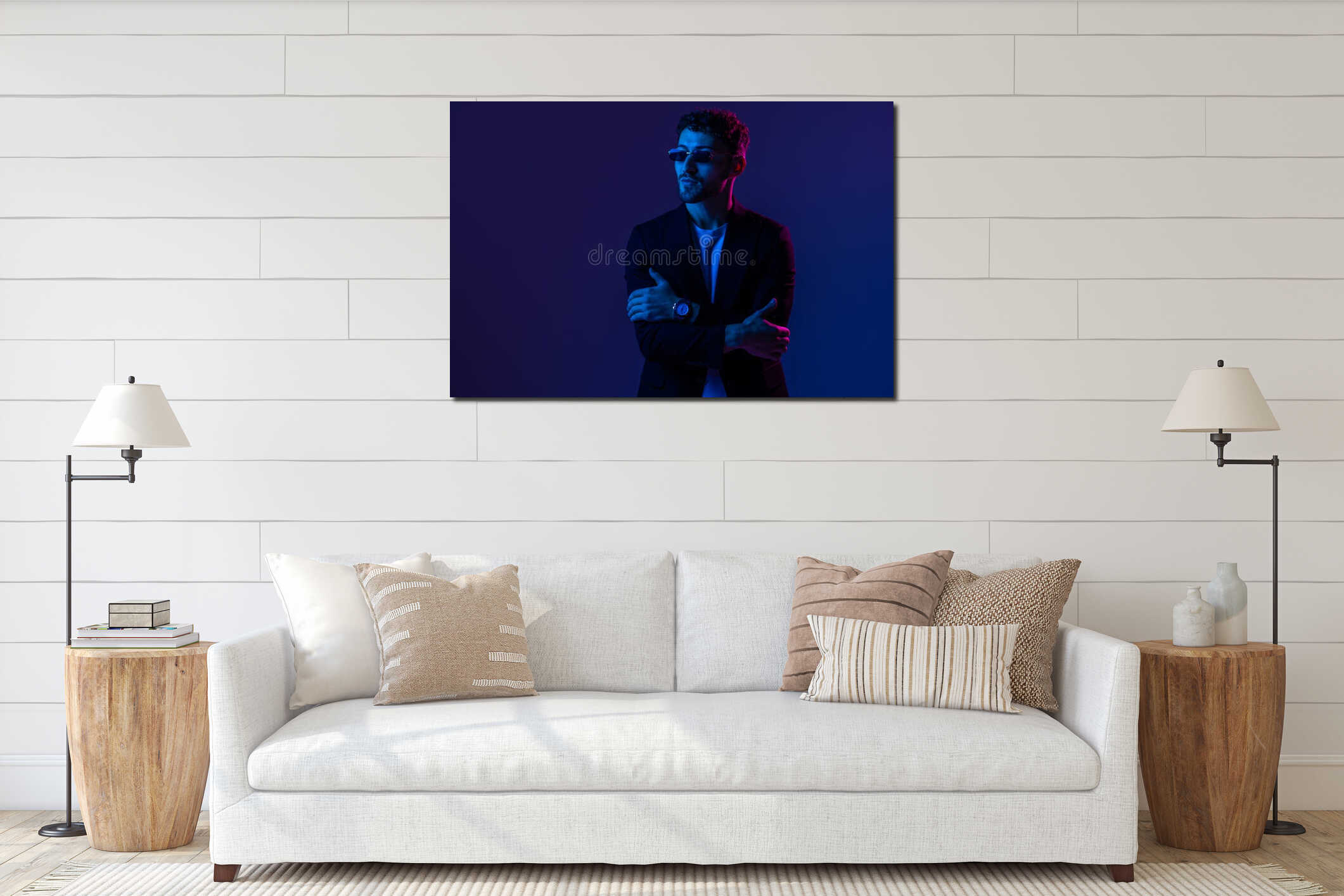 Young thoughtful man bright blue neon light interior mockup