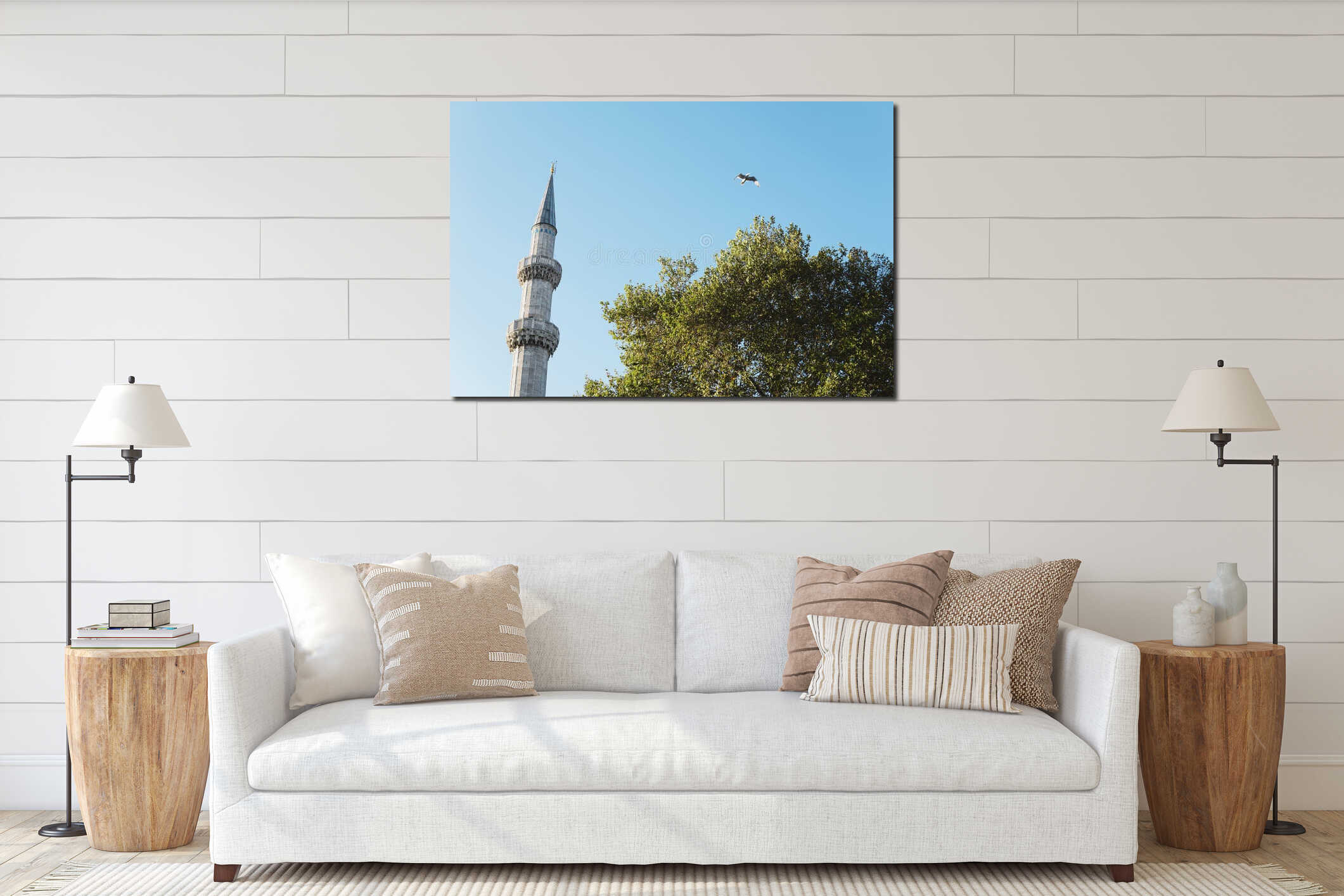 Minaret of Suleymaniye Mosque in Istanbul (Turkey) with tree, flying bird and clear blue sky in the background interior mockup