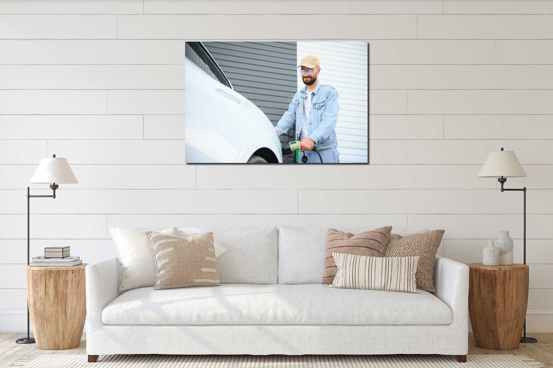 Stylish man inserts plug into the electric car charging socket interior mockup