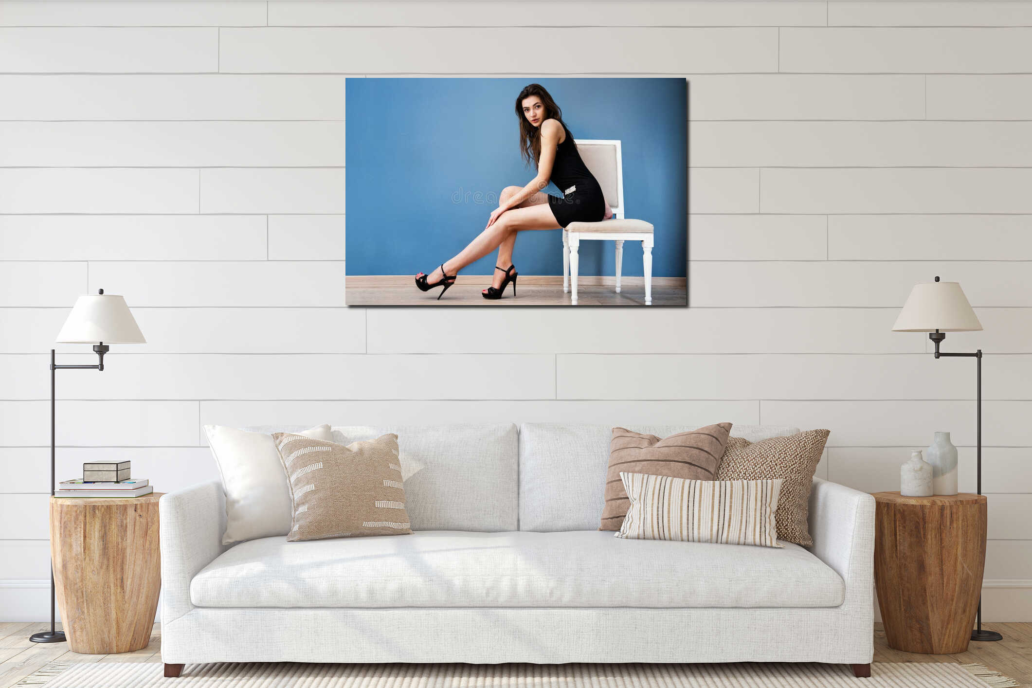 Fashion model woman posing on the chair behind the wall interior mockup