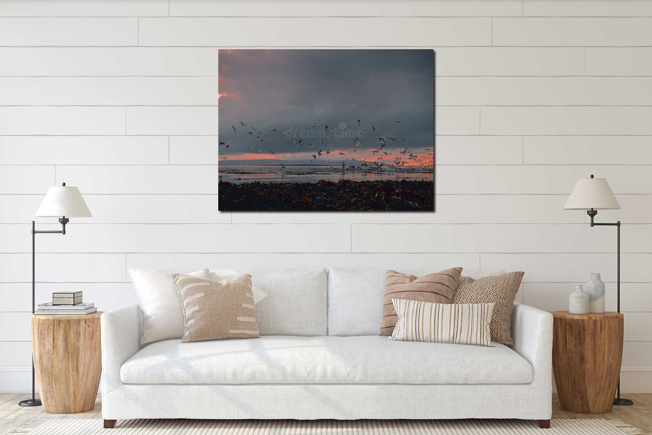 Huge flock of seagull flying low over the ocean looking for fresh mackerel fish pack at beautiful sunset over Galway bay, Ireland interior mockup