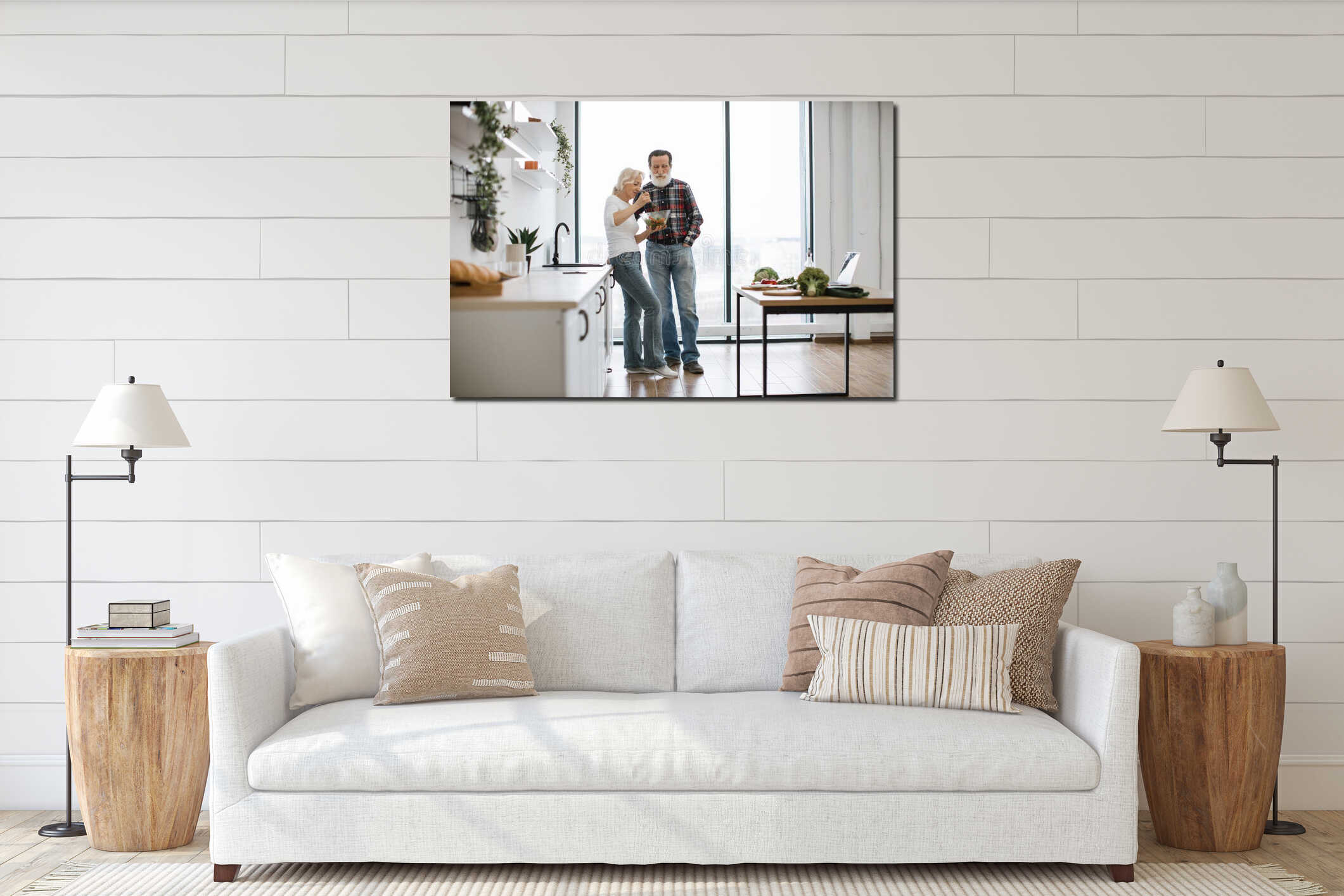 Elderly woman feeds man with healthy salad in glass bowl. interior mockup