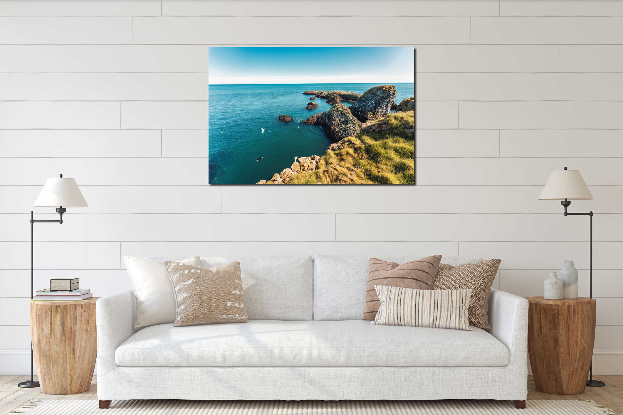 Snaefellsnes peninsula with flock of seagull flying by basalt rock formation in Arnarstapi fishing village interior mockup