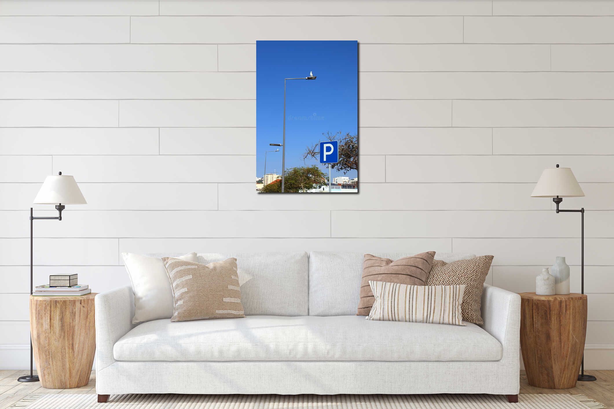 Seagull perched on a street lamp, next to a parking sign. interior mockup