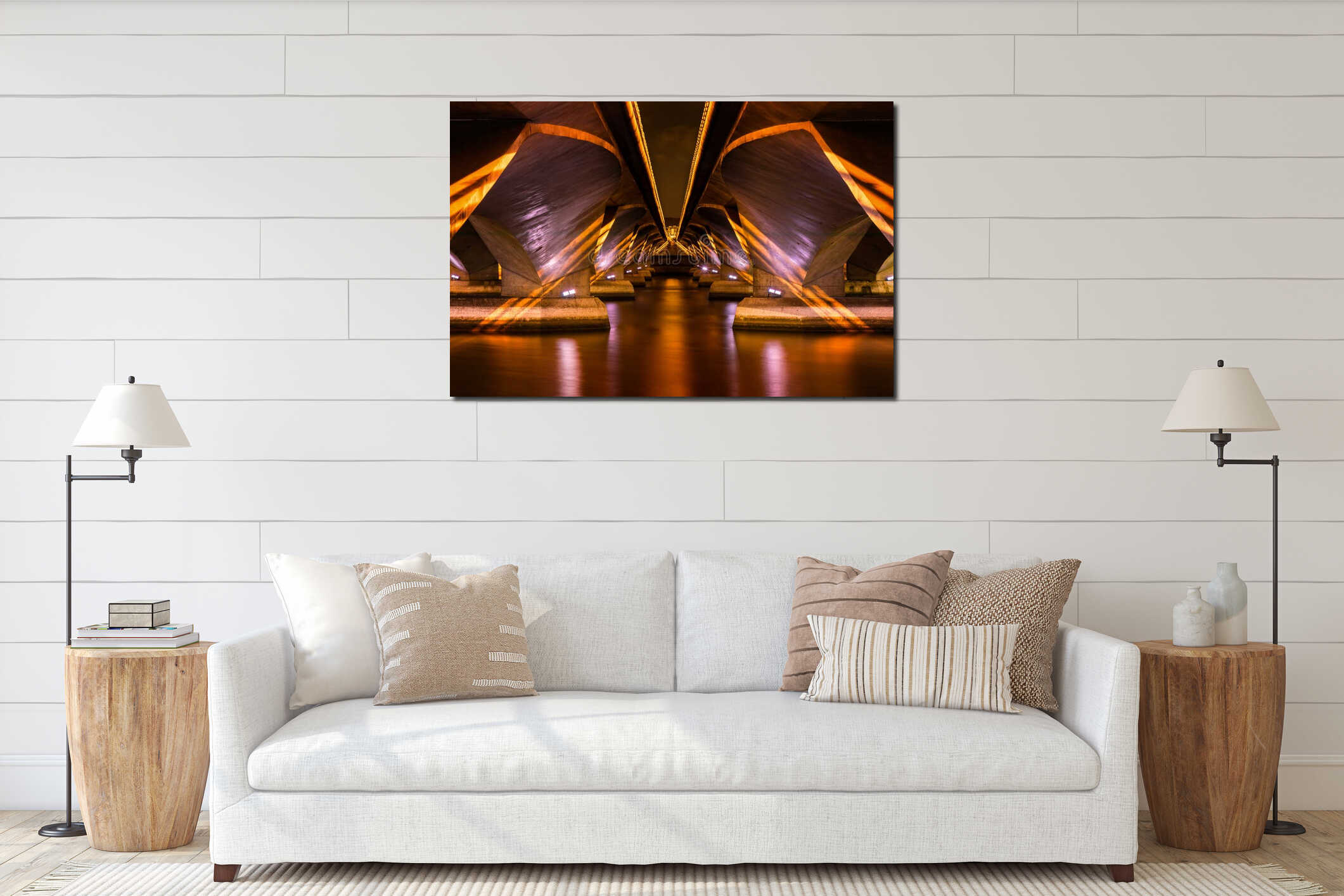 Golden symmetrical lights under a modern concrete bridge over a river interior mockup