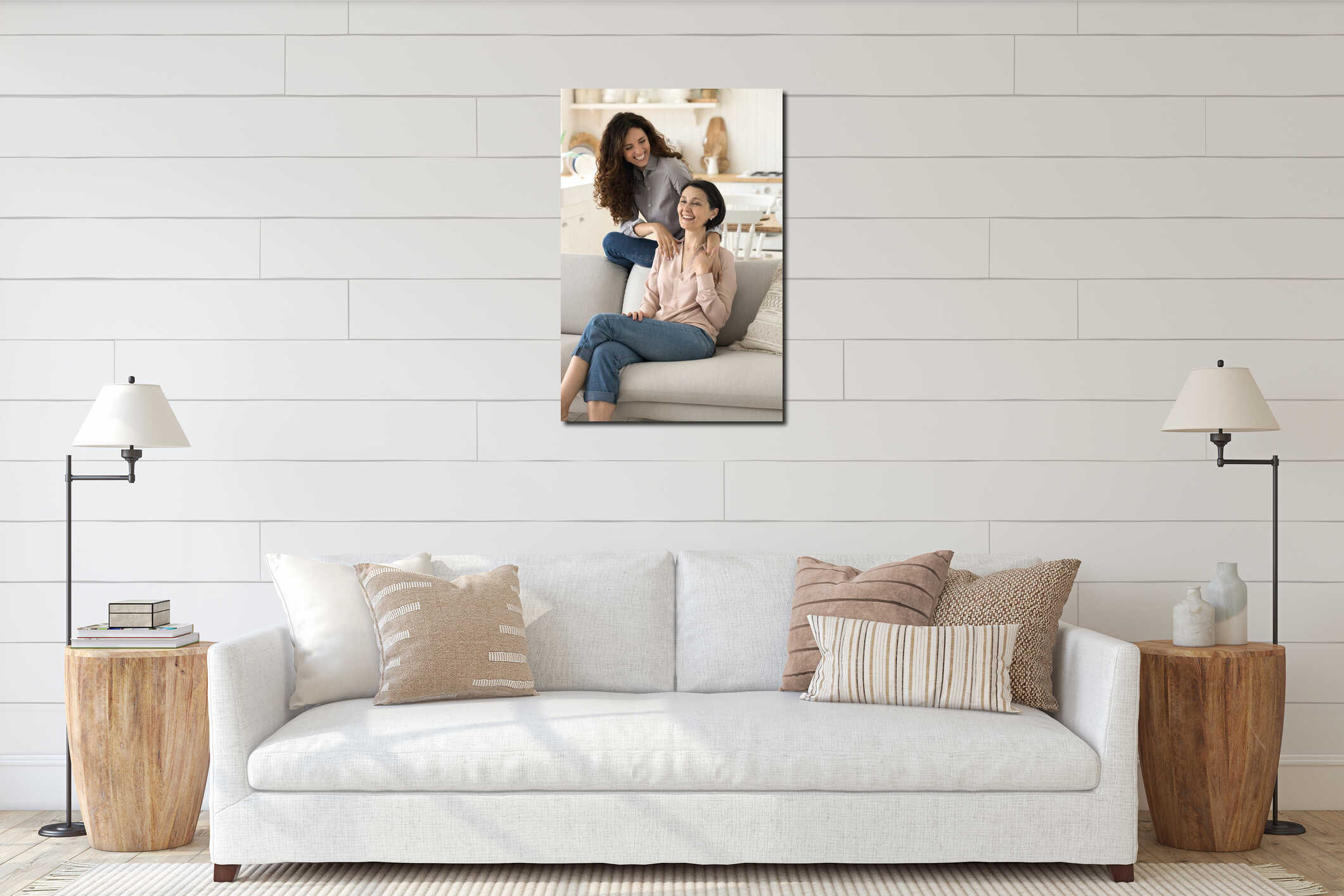 Multigenerational women laughing, joking, sit together on sofa interior mockup