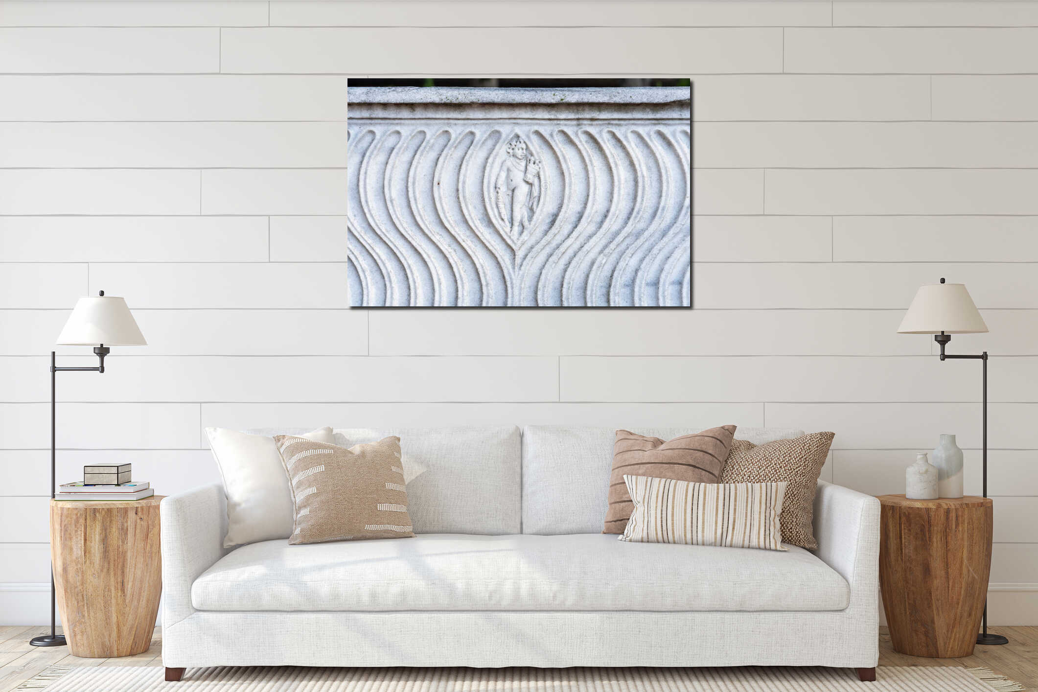 Close-up on ancient roman marble wall decorated with an engraved fisher surrounded by a classic pattern of carved curves interior mockup