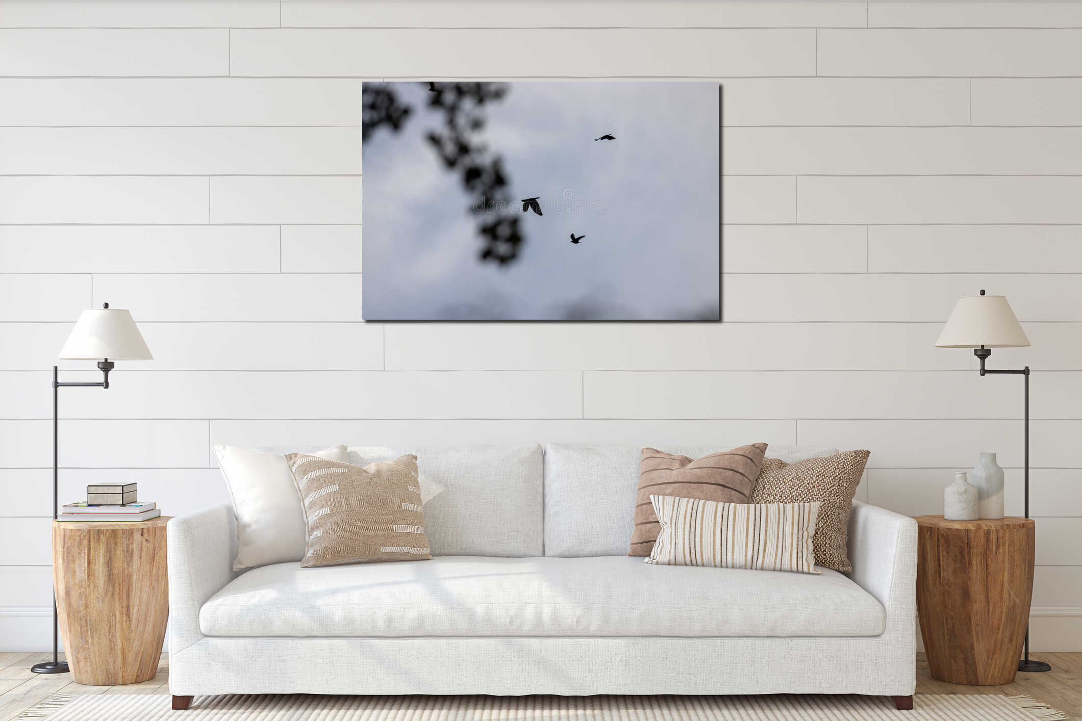 Birds flying near large trees and cloudy skies interior mockup