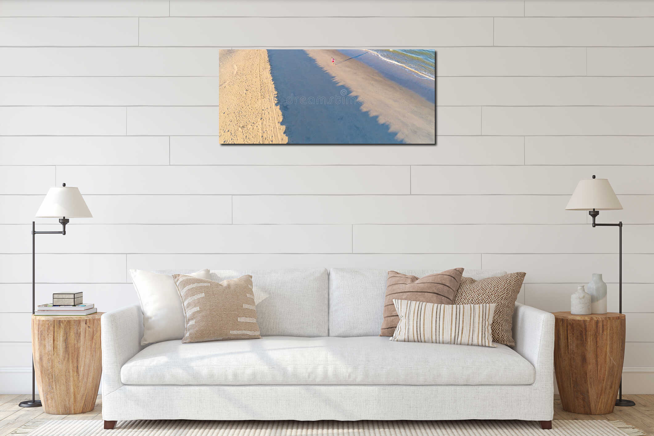 selective focus drone aerial view of a man walking on the beach in the morning, banner for background. Summer concept interior mockup