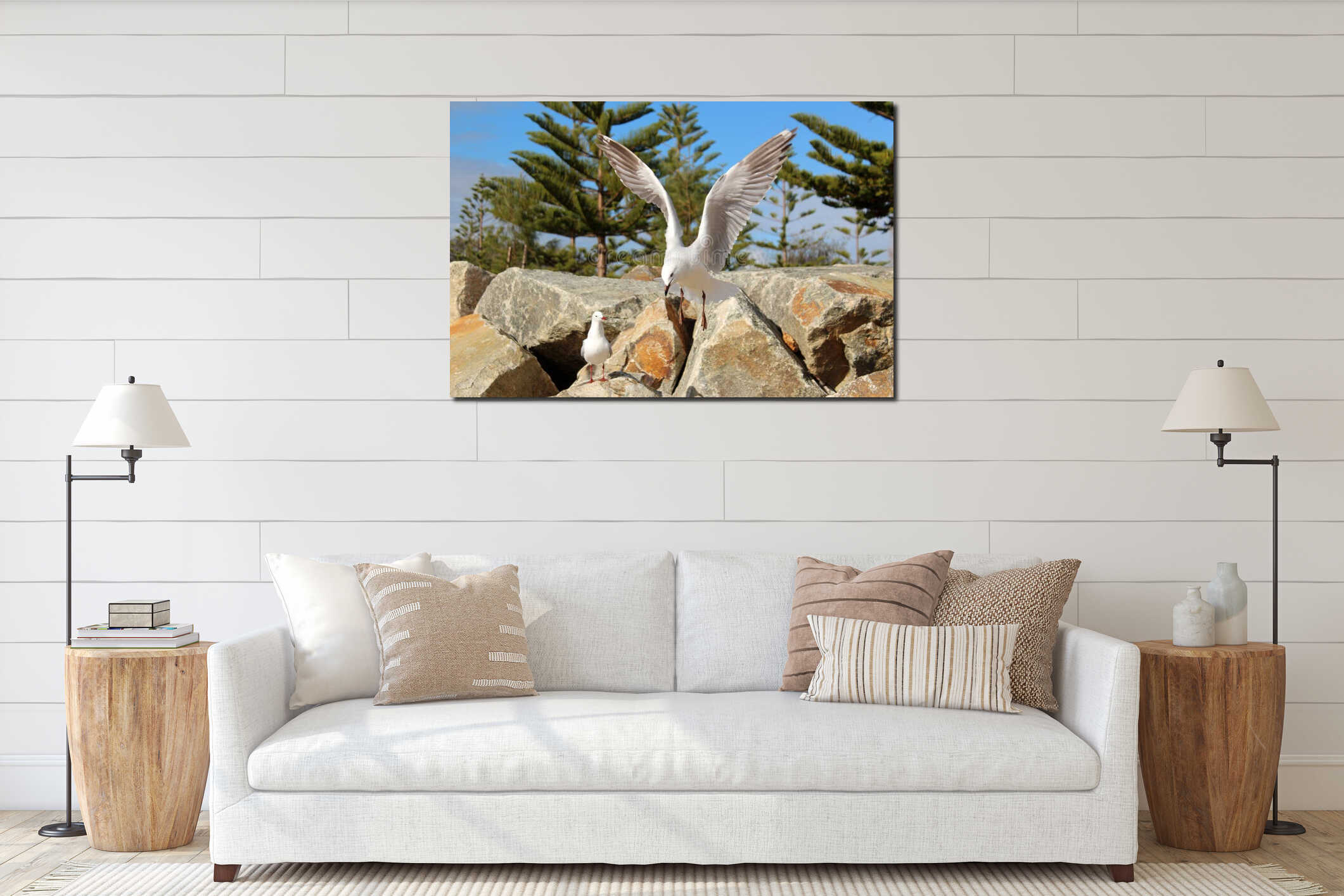 Graceful white seagull in flight against a backdrop of pine trees interior mockup