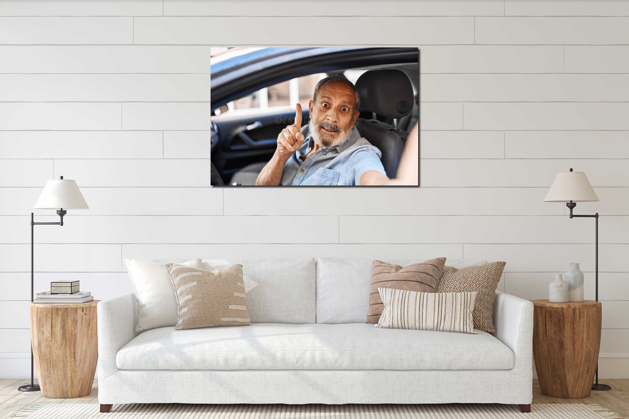 Cheerful senior man in car pointing finger up, making number one selfie interior mockup